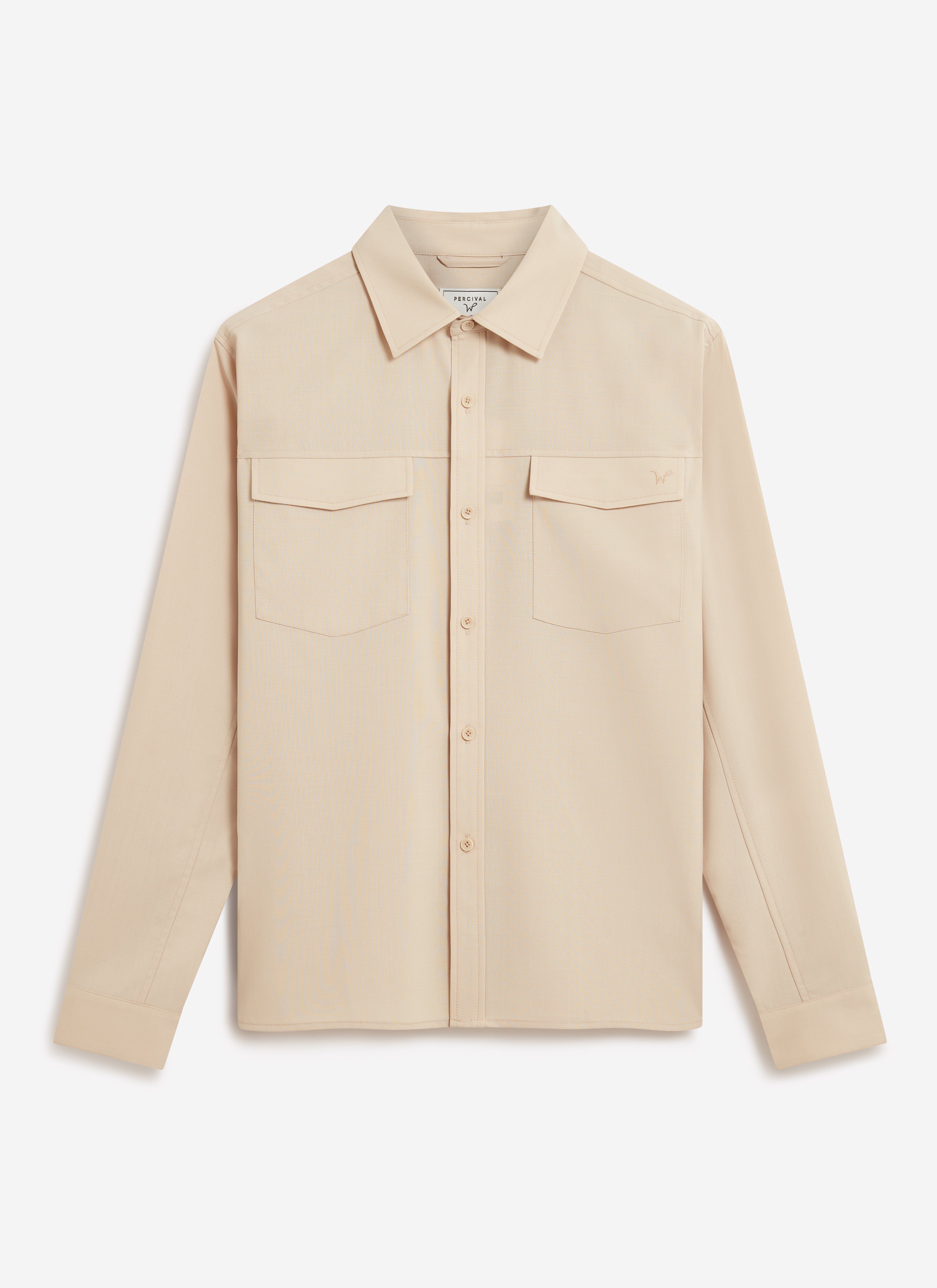 The Percival x Warren Safari Shirt in camel beige, a long-sleeved utility style, photographed on a white background.