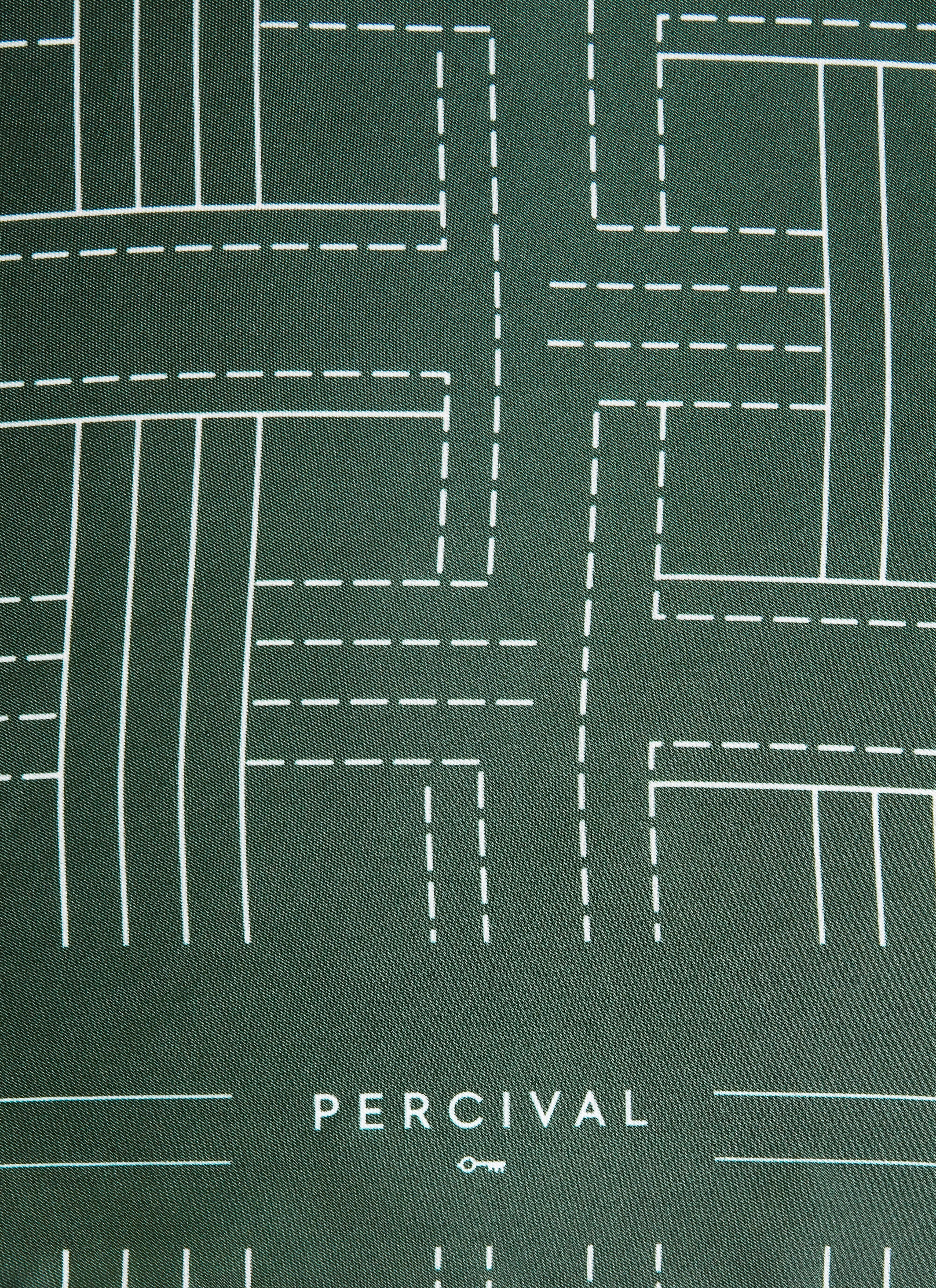 Close-up of the forest green silk Sashiko Neckerchief from Percival, showing the white geometric stitch pattern and logo.
