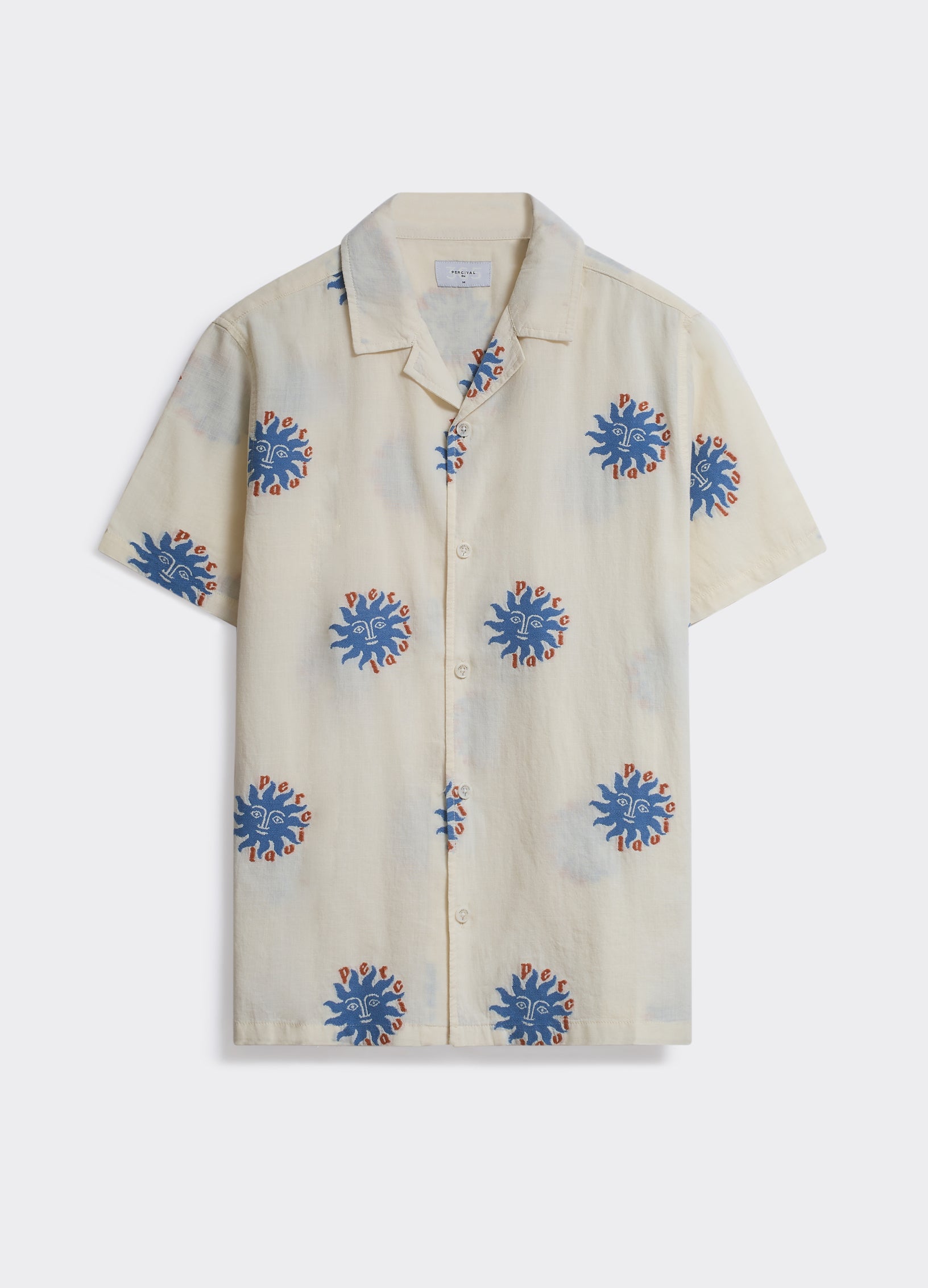 Percival Sun Shirt in ecru with an all-over blue sun print and camp collar, shown flat on a white background.