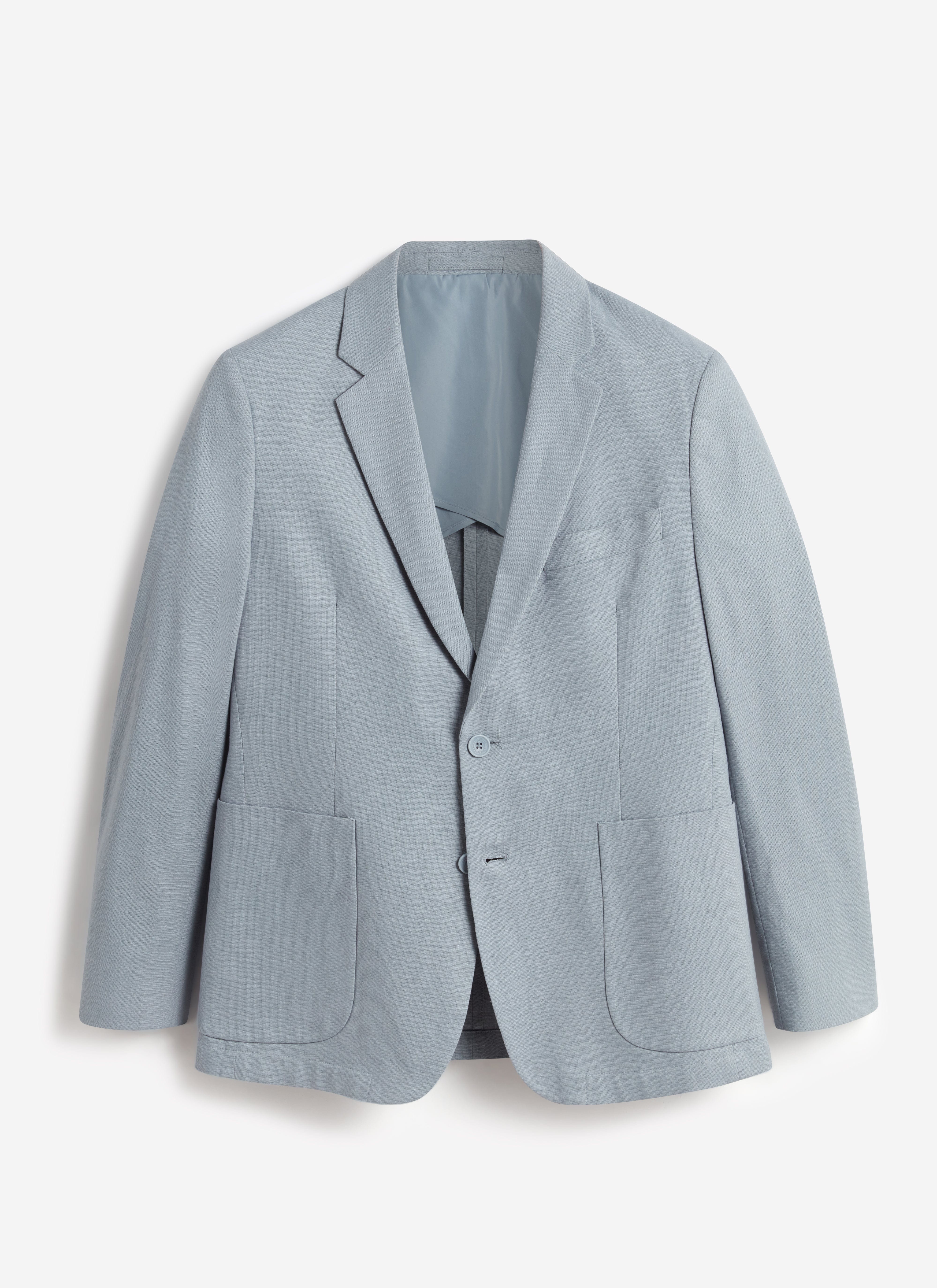 A flat lay of the Percival Tailored Linen Blazer in light blue, showing its single-breasted cut and front pockets.