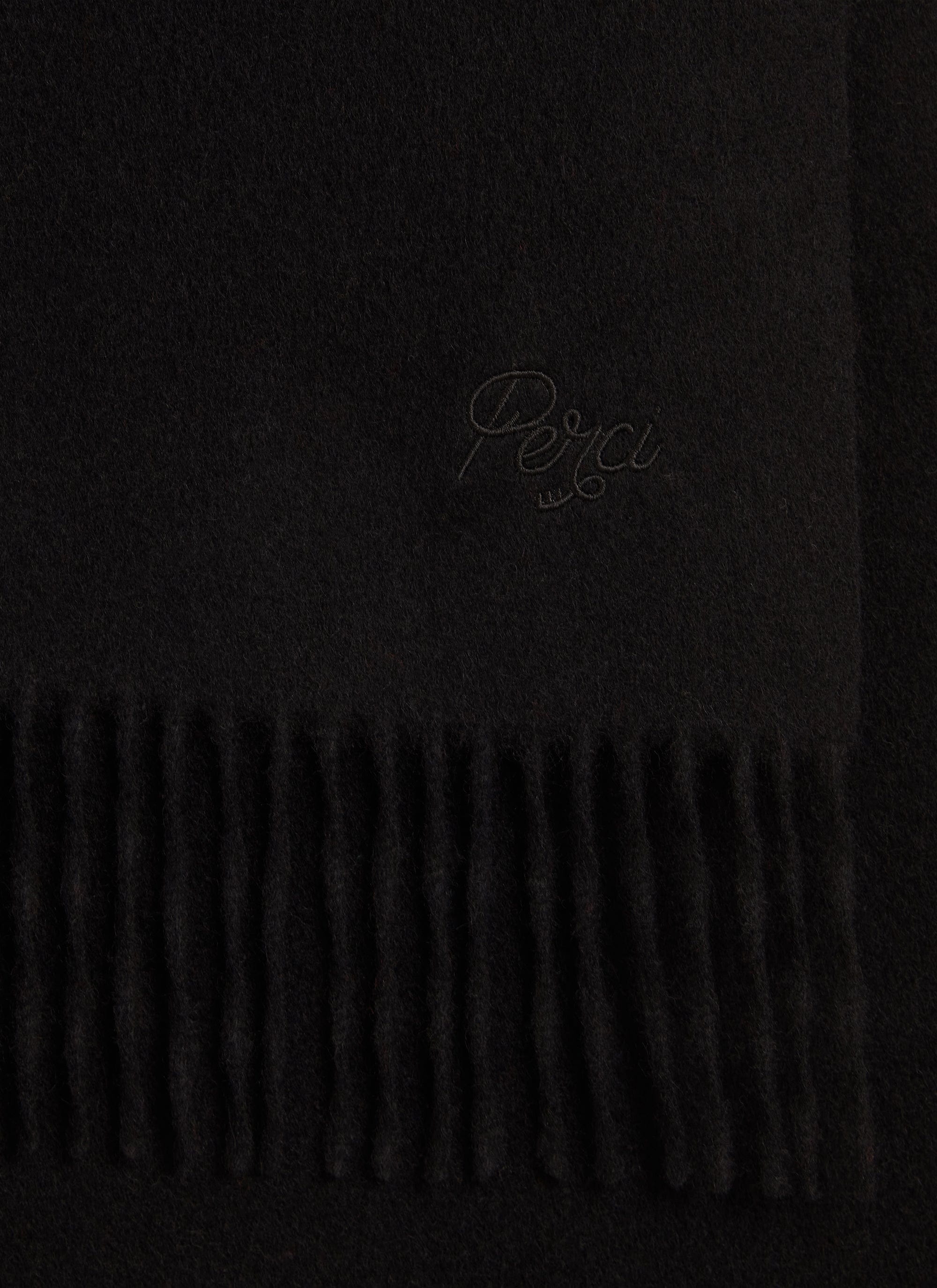 A close-up of the black wool Tolkein Scarf from Percival, showing the tonal embroidery and fringed edge.