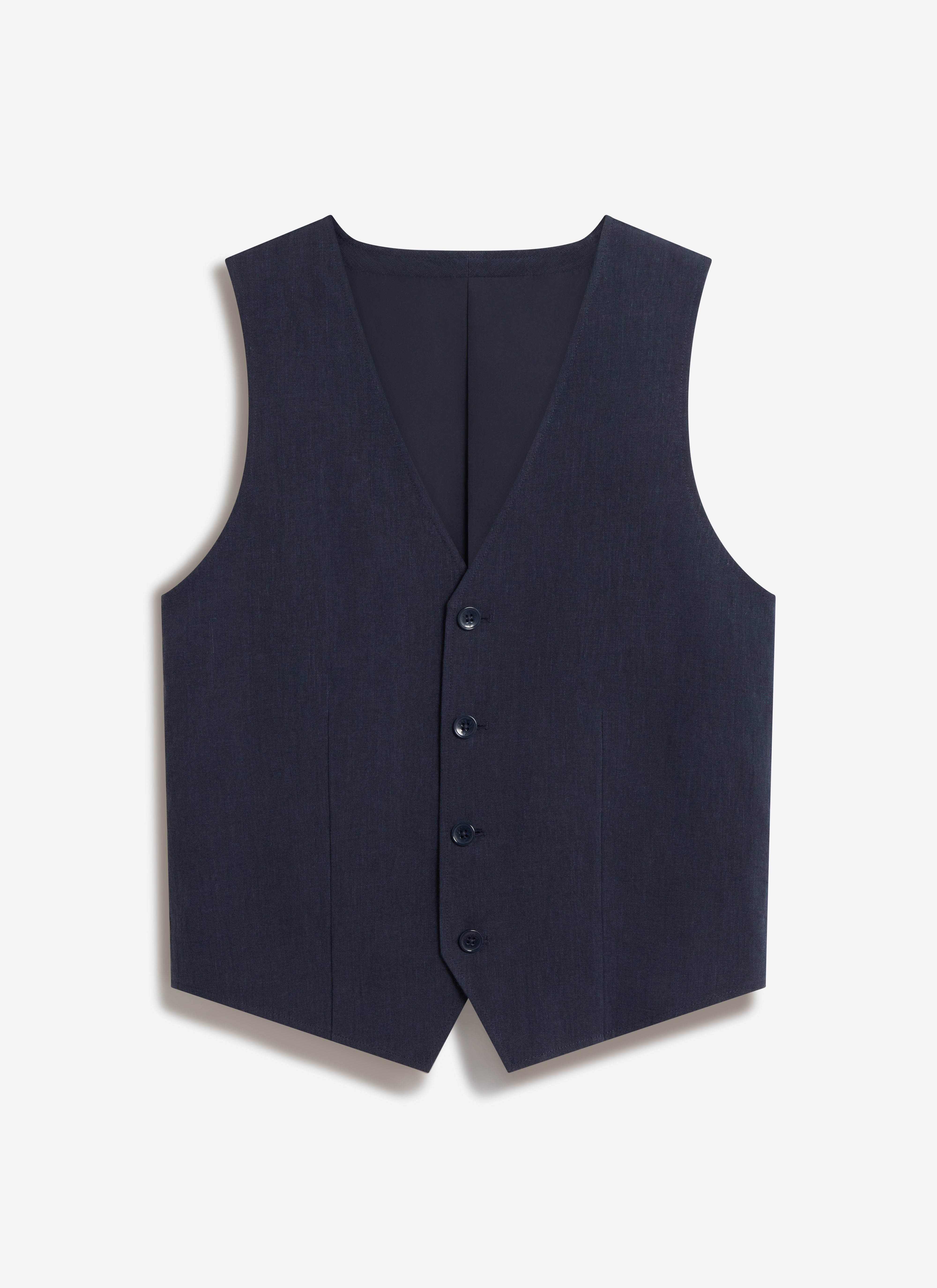 A flat lay studio shot of the Percival waistcoat in navy linen, showing the classic v-neck and three-button front.