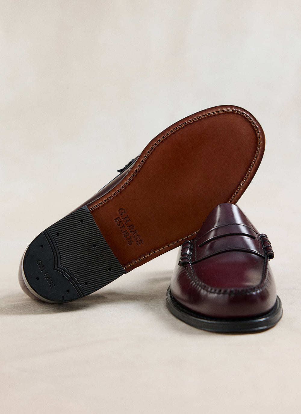 Close-up of G.H. Bass wine polished leather Weejun Larson penny loafer, showing the leather sole and stitching.