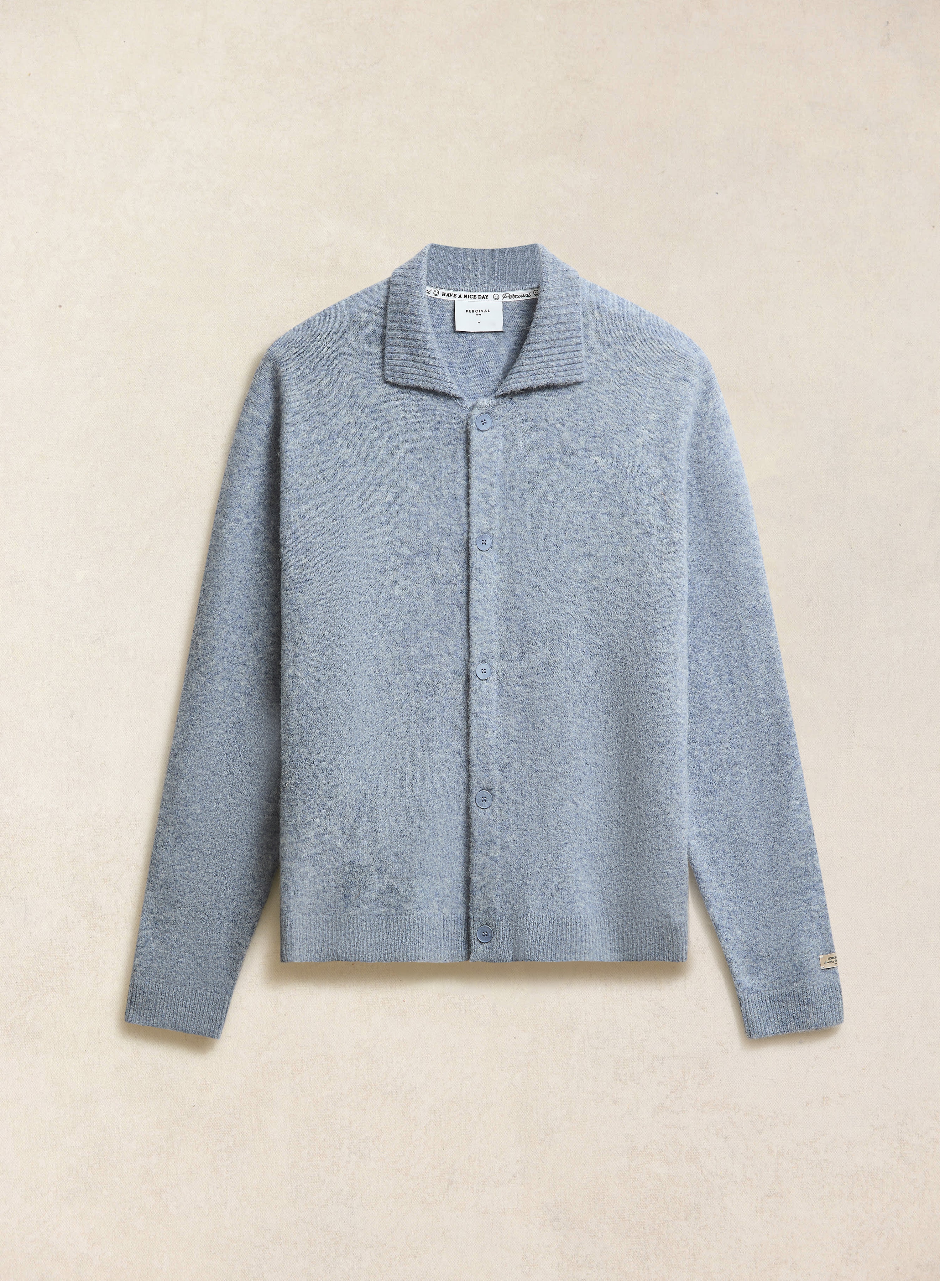 The Percival Archive Knit Collared Cardigan in heather blue yak wool, displayed flat on a neutral background.