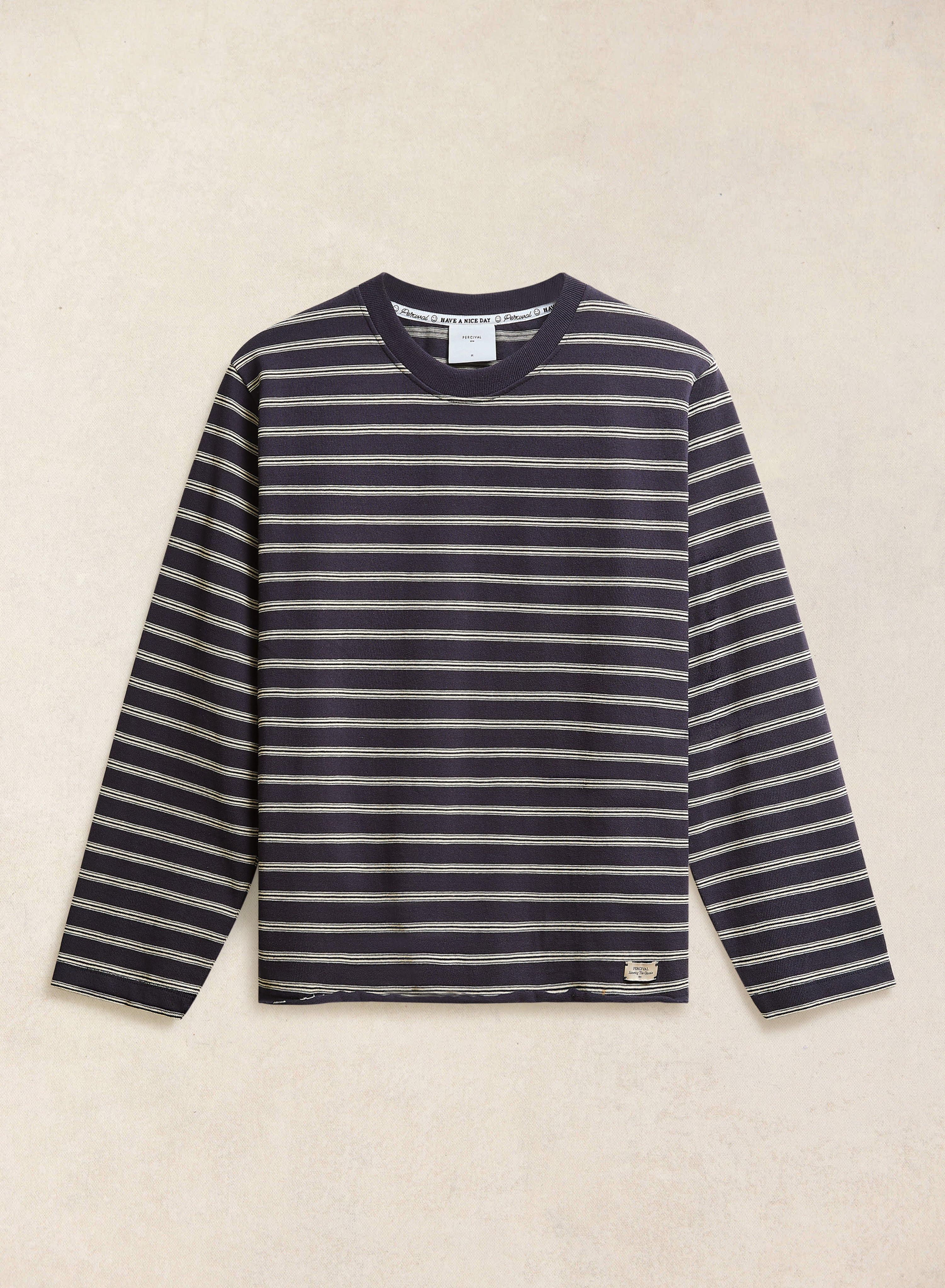 The Arlo long-sleeve Breton t-shirt by Percival in navy stripe, shown flat-lay against a neutral background.