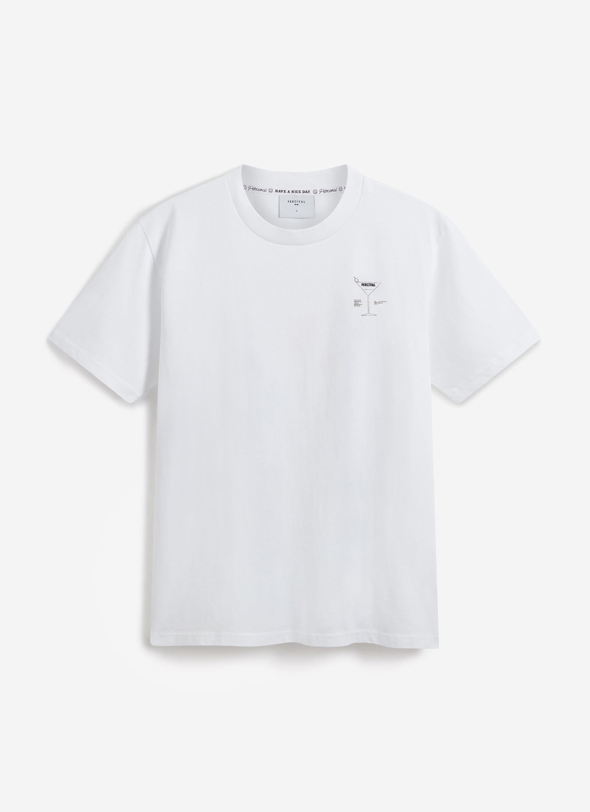 The Percival Bartender Oversized T-shirt in white organic cotton, laid flat to showcase the front and chest cocktail graphic.