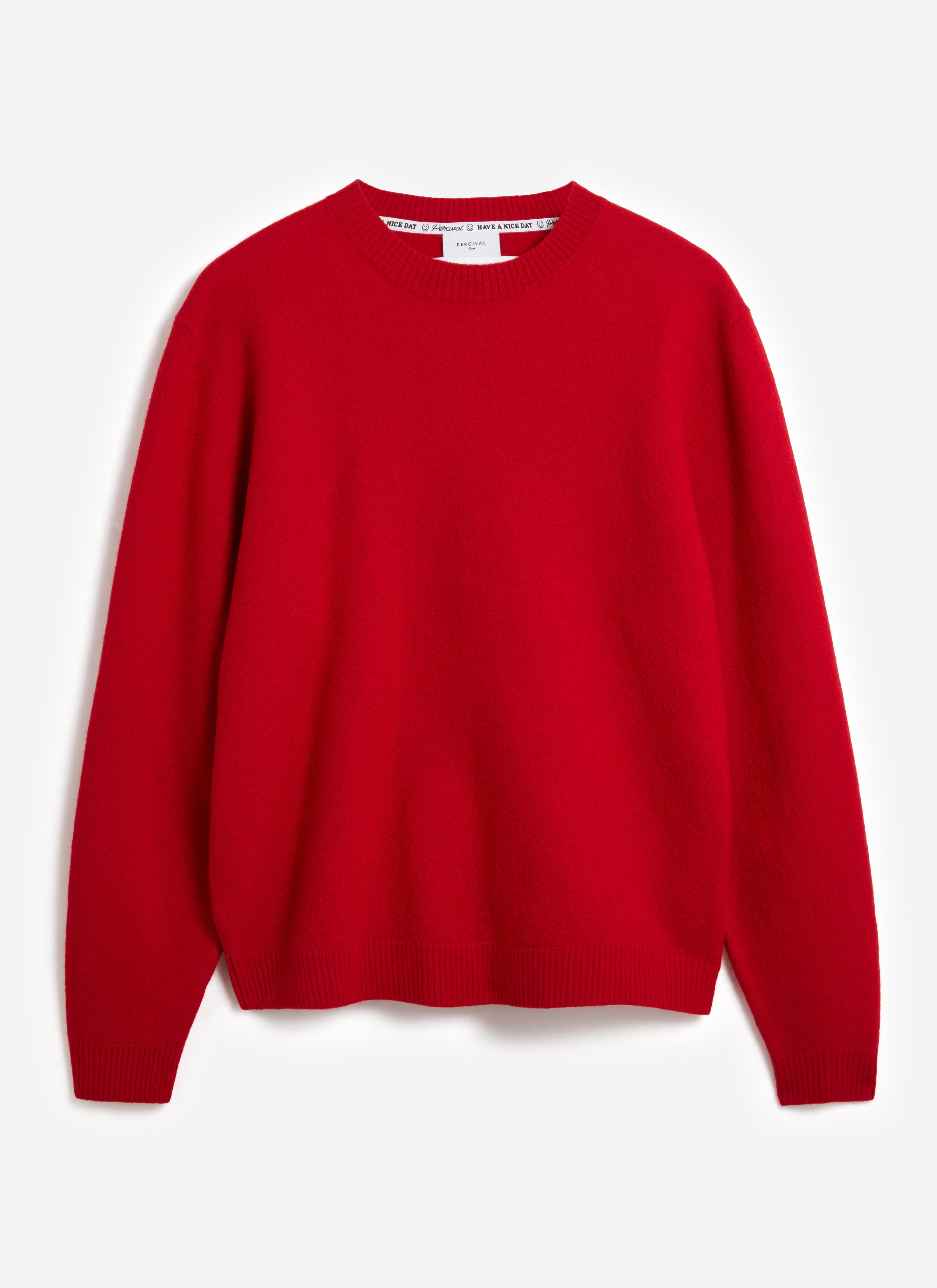 A flat lay image of the Percival Felted Regular Jumper in red merino wool, against a clean white background.