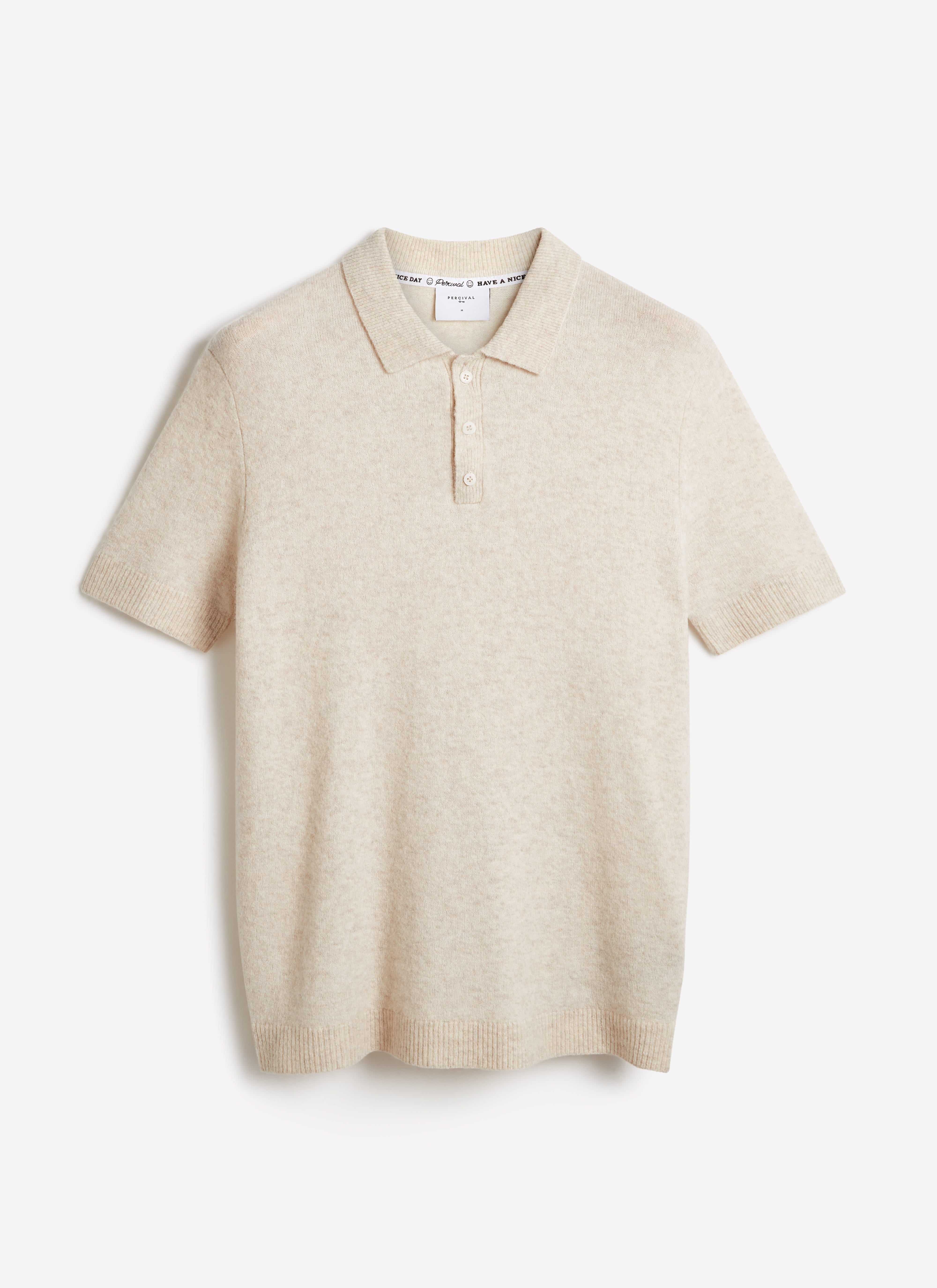 Percival Collins Boxy Knitted Polo in ecru cream yak-wool blend, featuring short sleeves and a three-button placket.