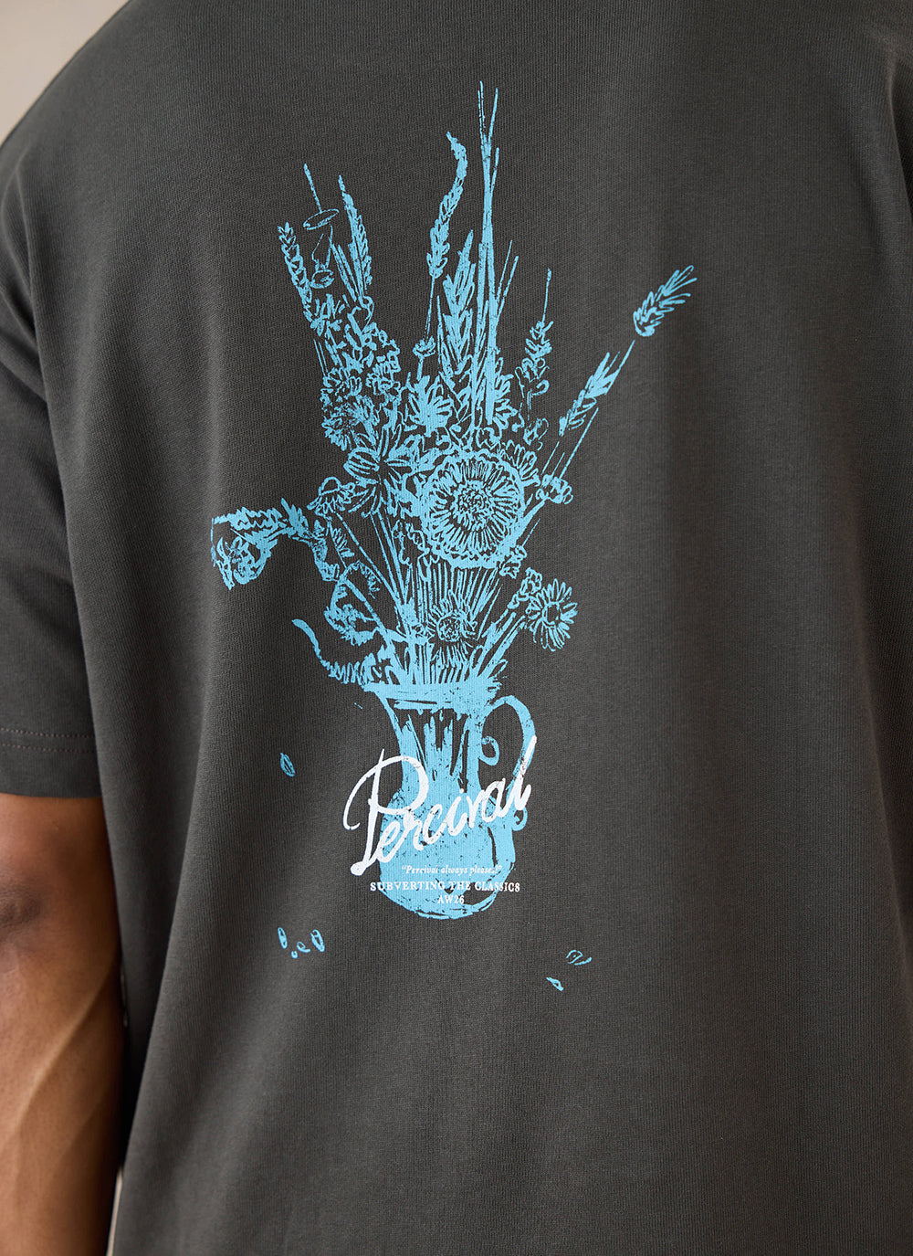 Charcoal organic cotton Percival Dawson T-shirt featuring a large blue floral vase graphic on the back.