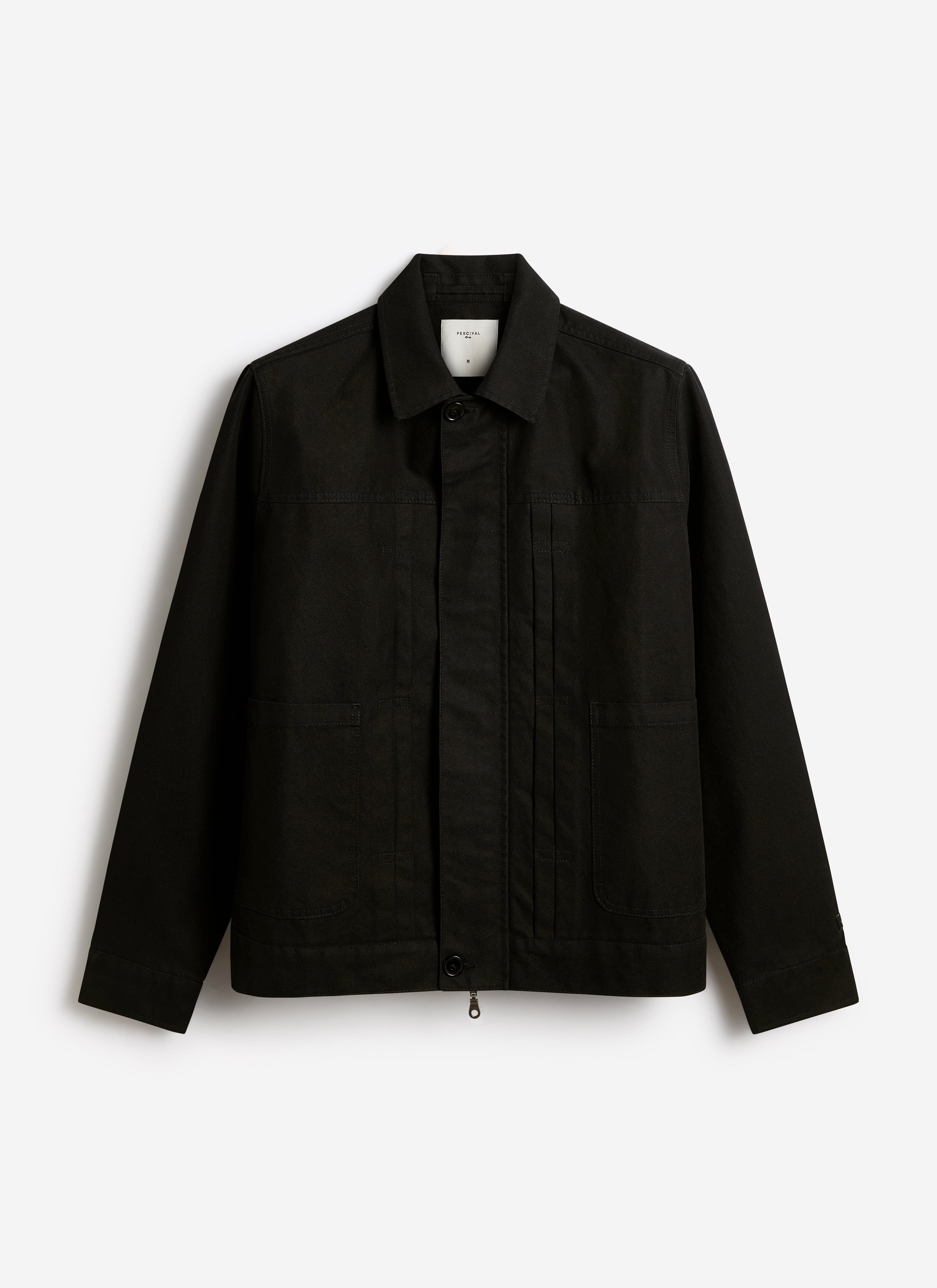 A black Percival Ernst jacket in cotton-rich stretch fabric featuring a double pleated front and clean boxy fit.