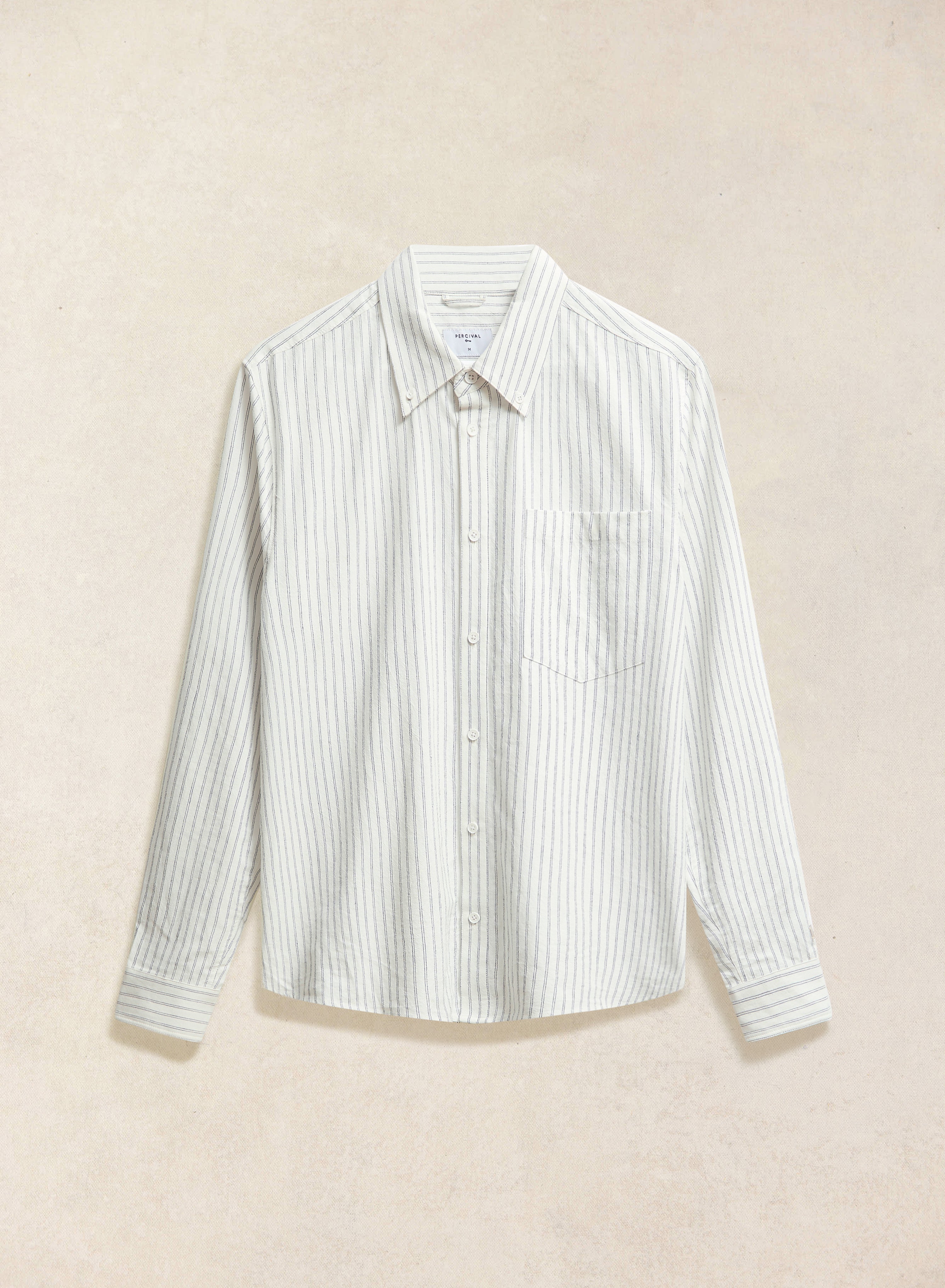 The Percival Fabian Striped Oxford Shirt in white, displayed flat with thin vertical stripes and a chest pocket.