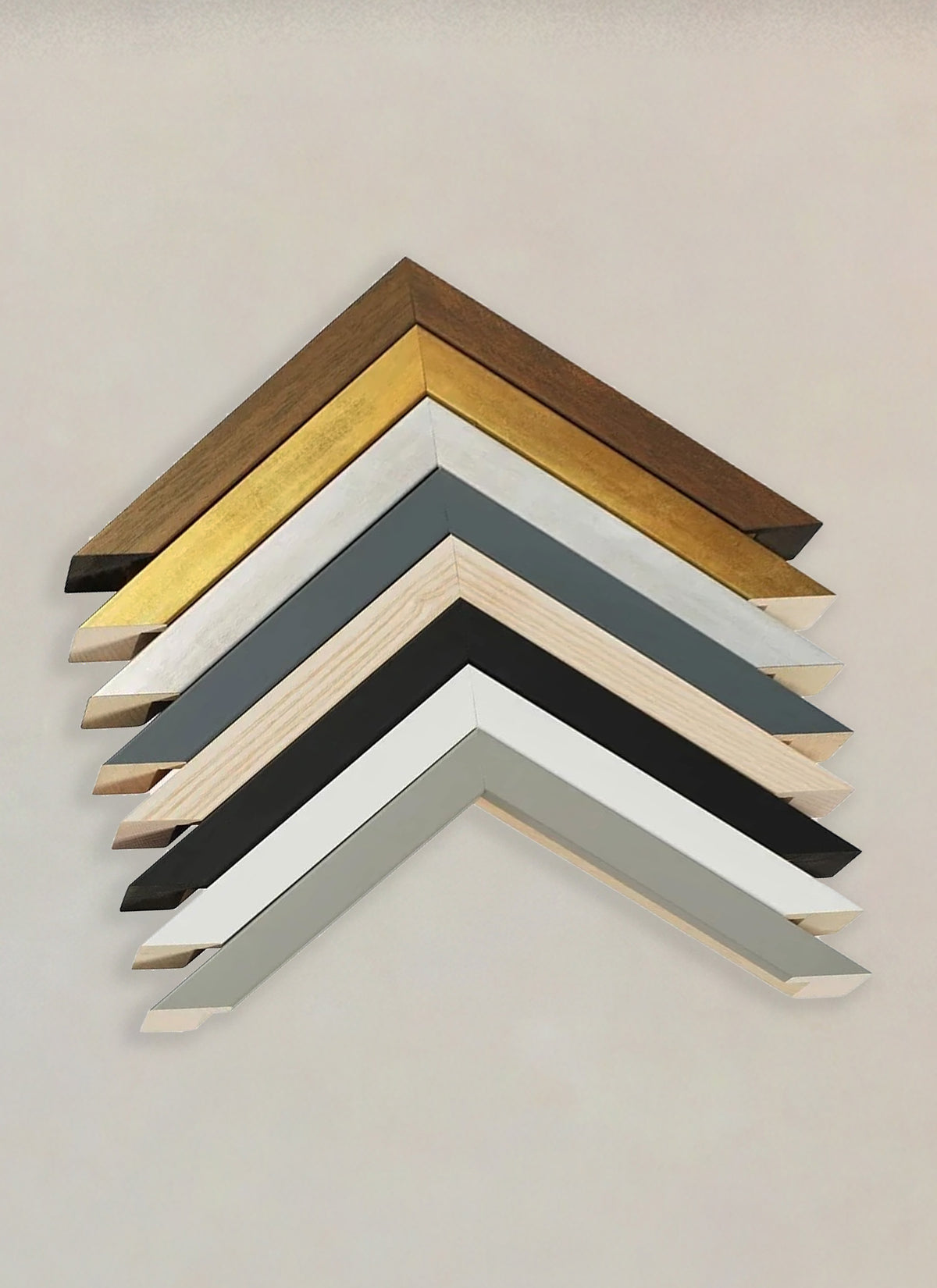 Solid wood framing options for Percival art prints, displaying various finishes from crisp white to natural wood.