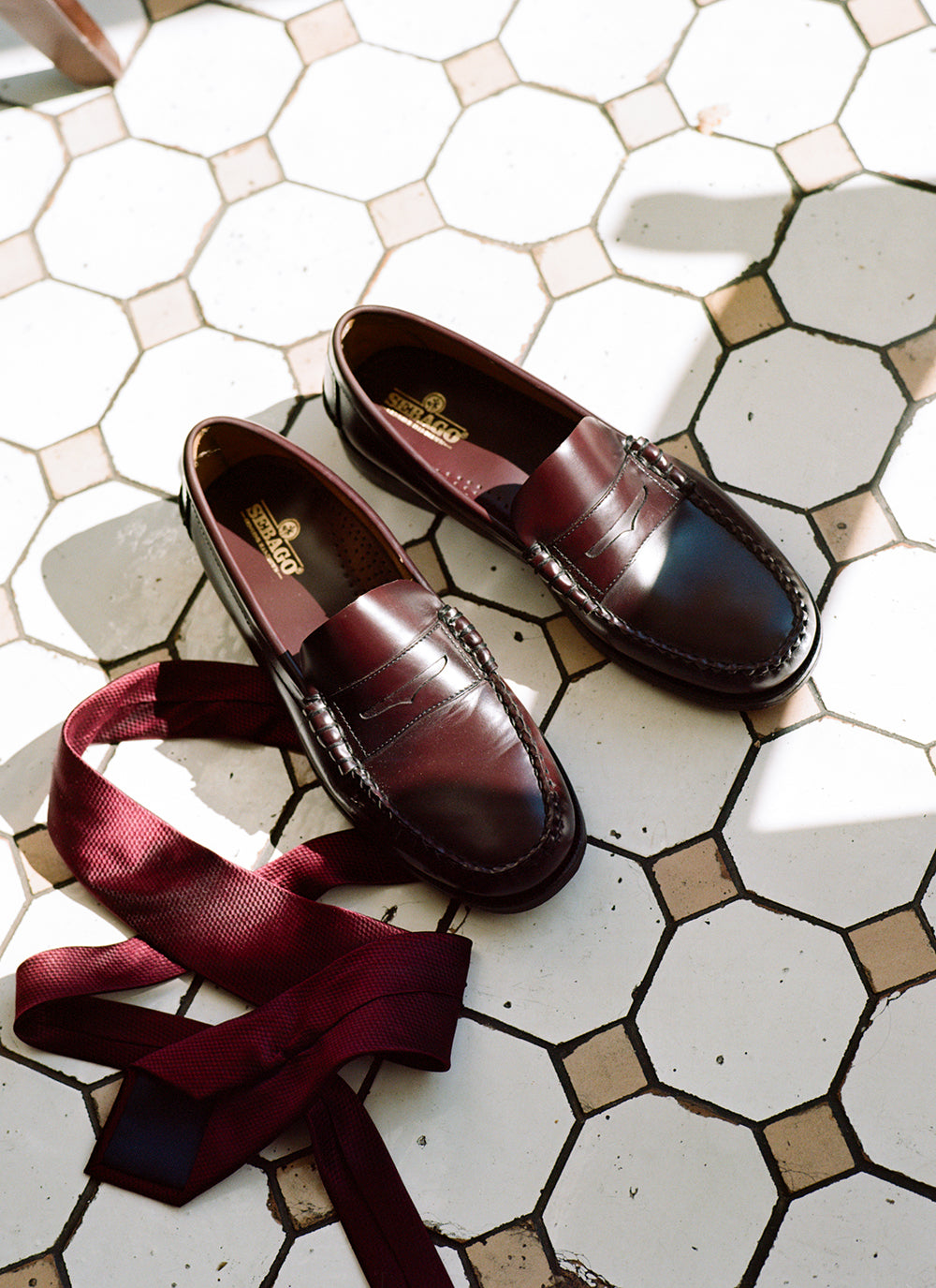 The Percival G.H. Bass Weejun Larson Penny Loafer in Wine and the Percival Red Silk Grenadine Tie.