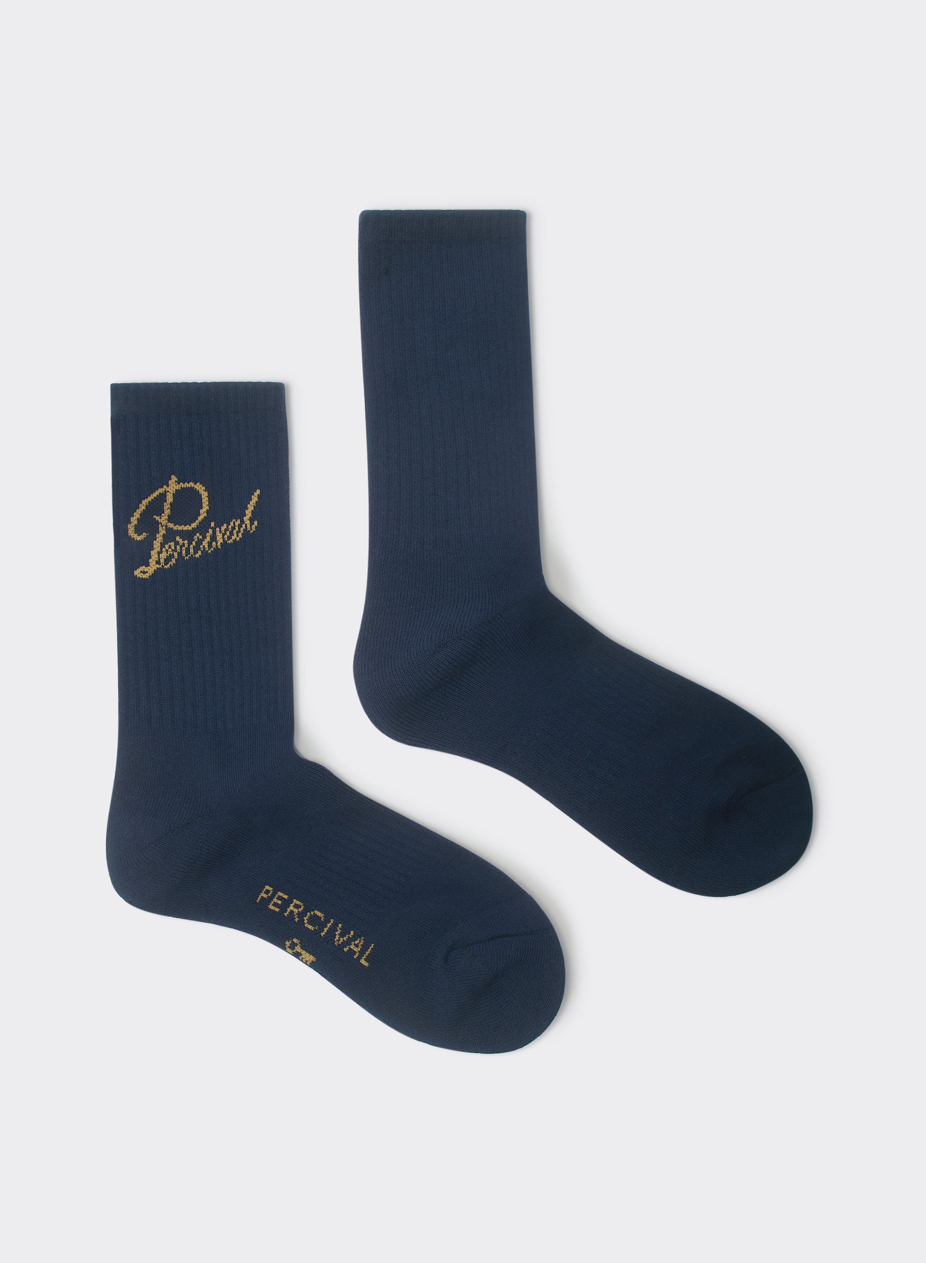 Navy Percival Kingsley Jacquard socks in a cotton-blend with gold logo details, shown flat on a light grey background.