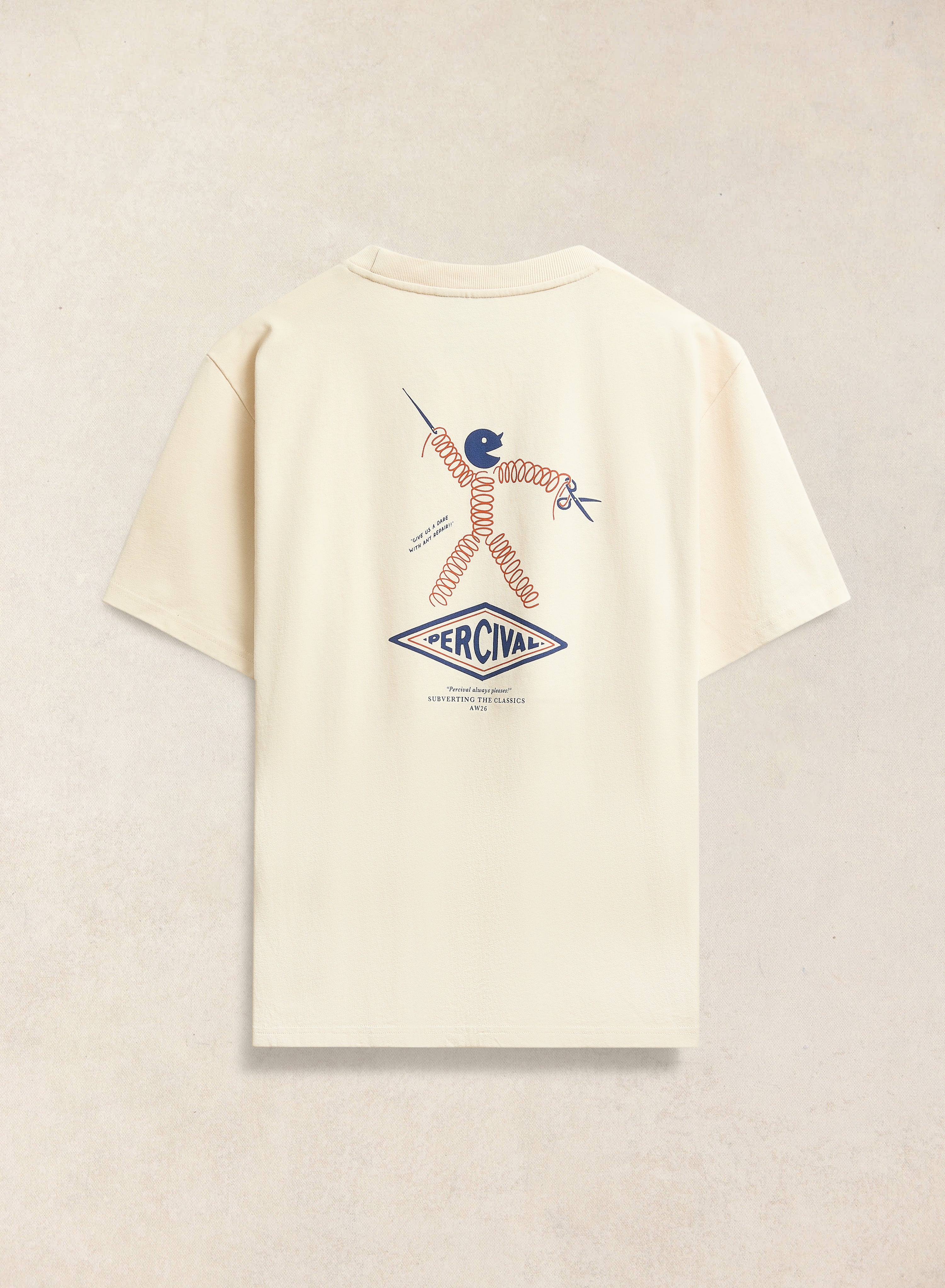 The back of the cream Percival Kingston oversized t-shirt, featuring a large repair shop character graphic artwork.
