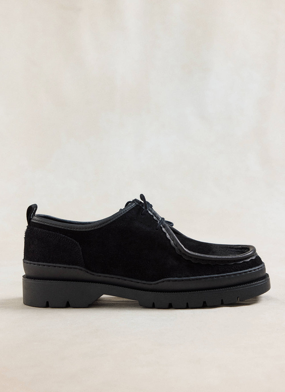 Close-up of the Kleman Major VP Oak 2 shoe in black suede, featuring a lug sole and stitched moc-toe detail.