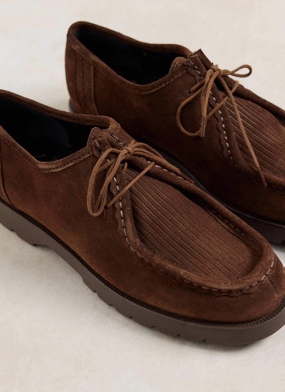 Close-up of the brown Kleman Padrini V Cord shoes showcasing the textured corduroy panel and laced moccasin design.