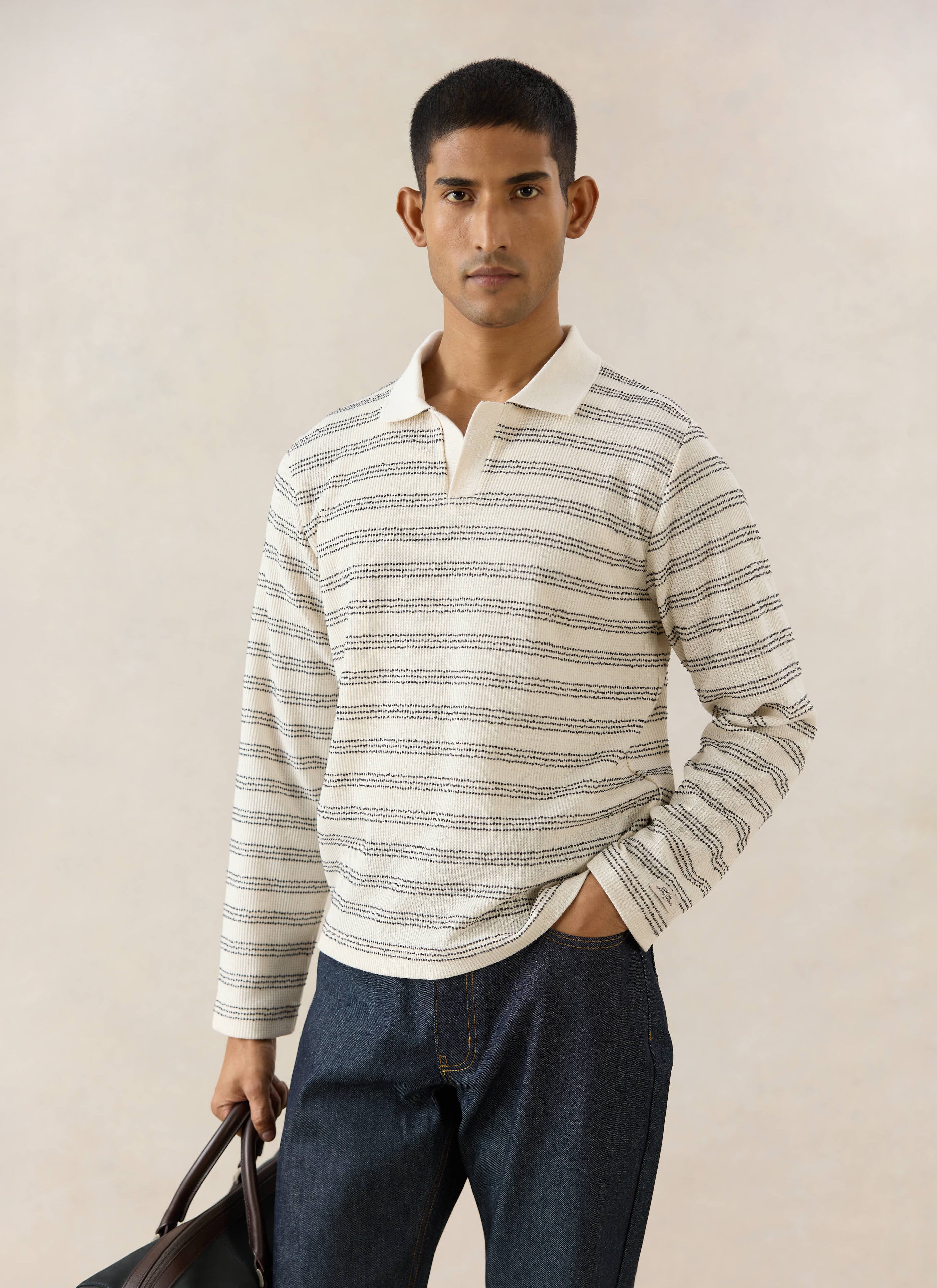 Percival Laurent Long Sleeve Polo in cream stripe, styled with dark Heritage jeans from the new season collection.