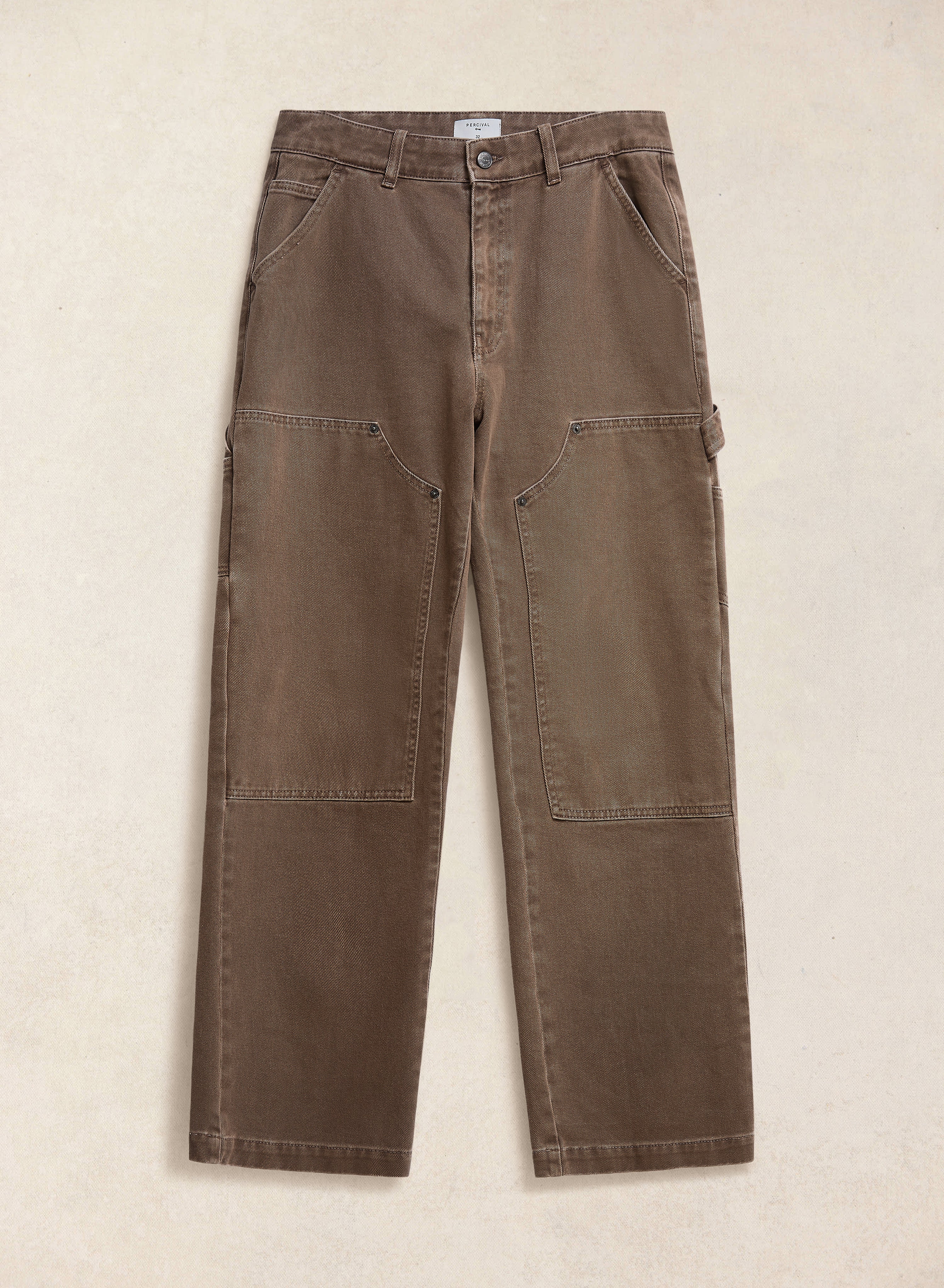 Mocha brown Percival Lucas Carpenter cotton trousers in a straight leg fit with knee patches, shown flat.