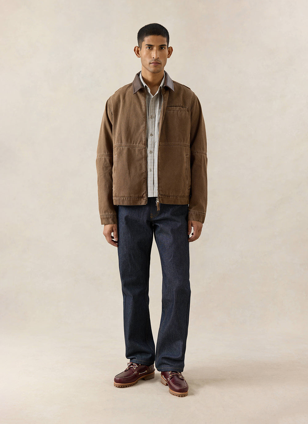 A model wears the mocha Percival Lucas Contrast Collar Jacket, styled with dark jeans and burgundy boat shoes.