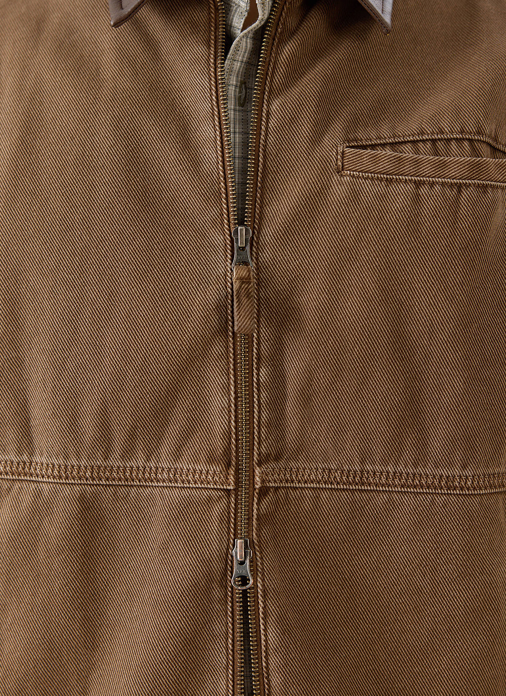 A close-up of the mocha cotton twill and two-way zip on the Percival Lucas Contrast Collar Jacket.