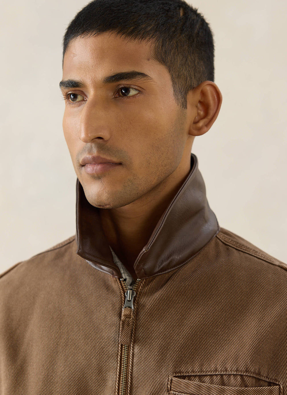 Close-up of a model wearing the mocha brown Percival contrast collar jacket, highlighting the collar detail.