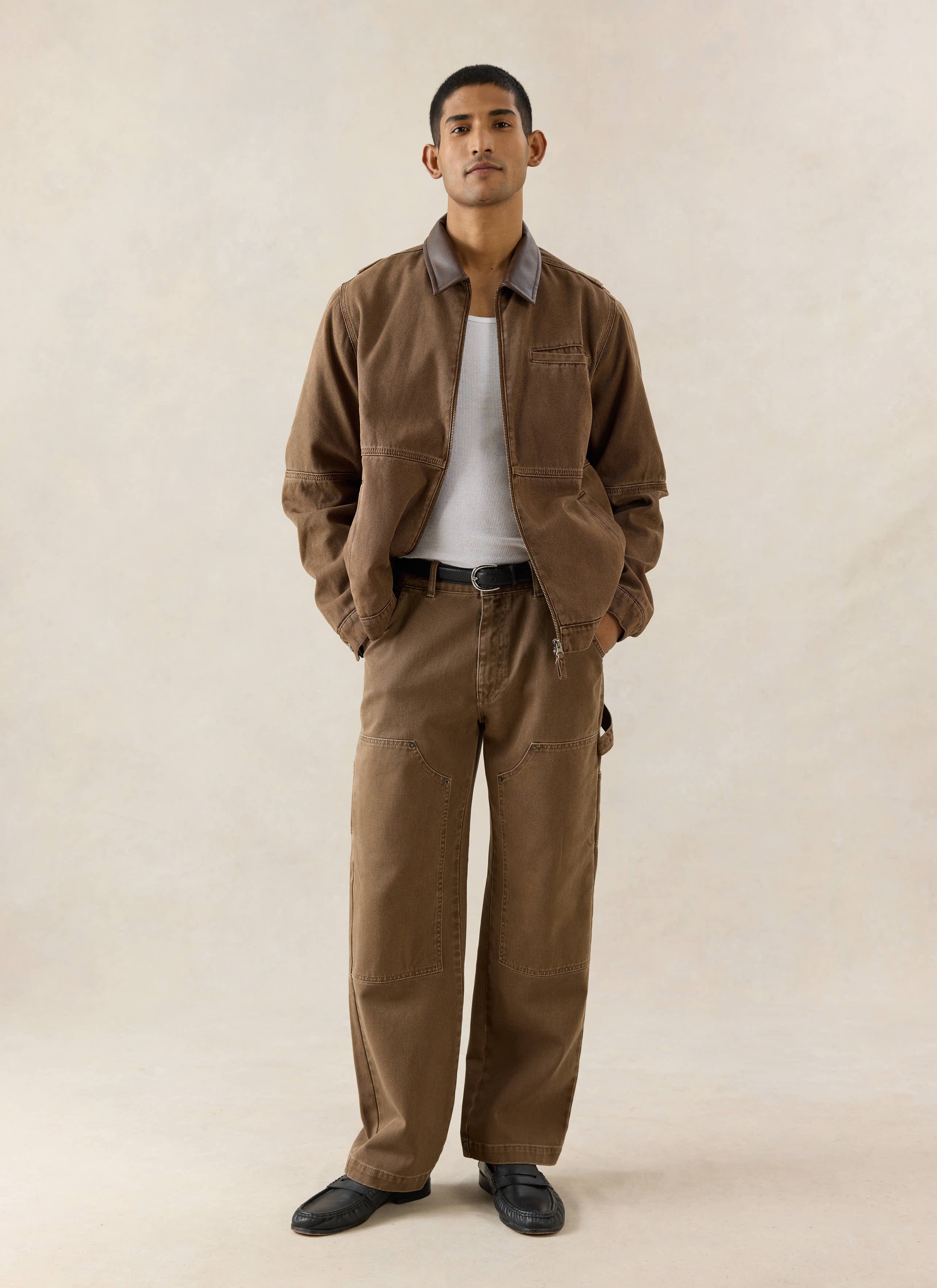Mocha brown Percival Lucas Carpenter trousers with knee patches and hammer loop, styled with a matching jacket.