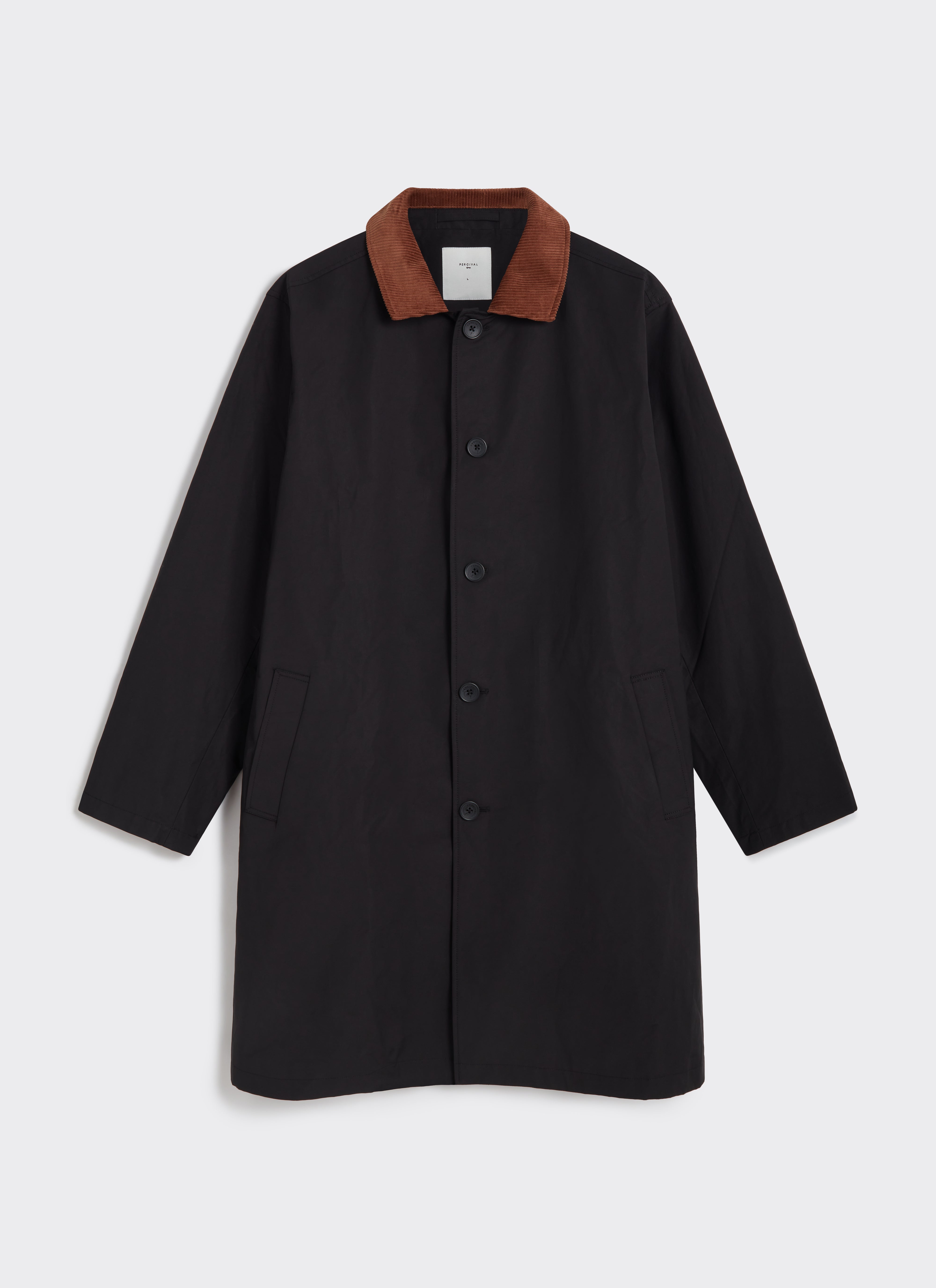 The Percival Mac Cord Collar Coat in black cotton, featuring a tan corduroy collar and single-breasted button front.