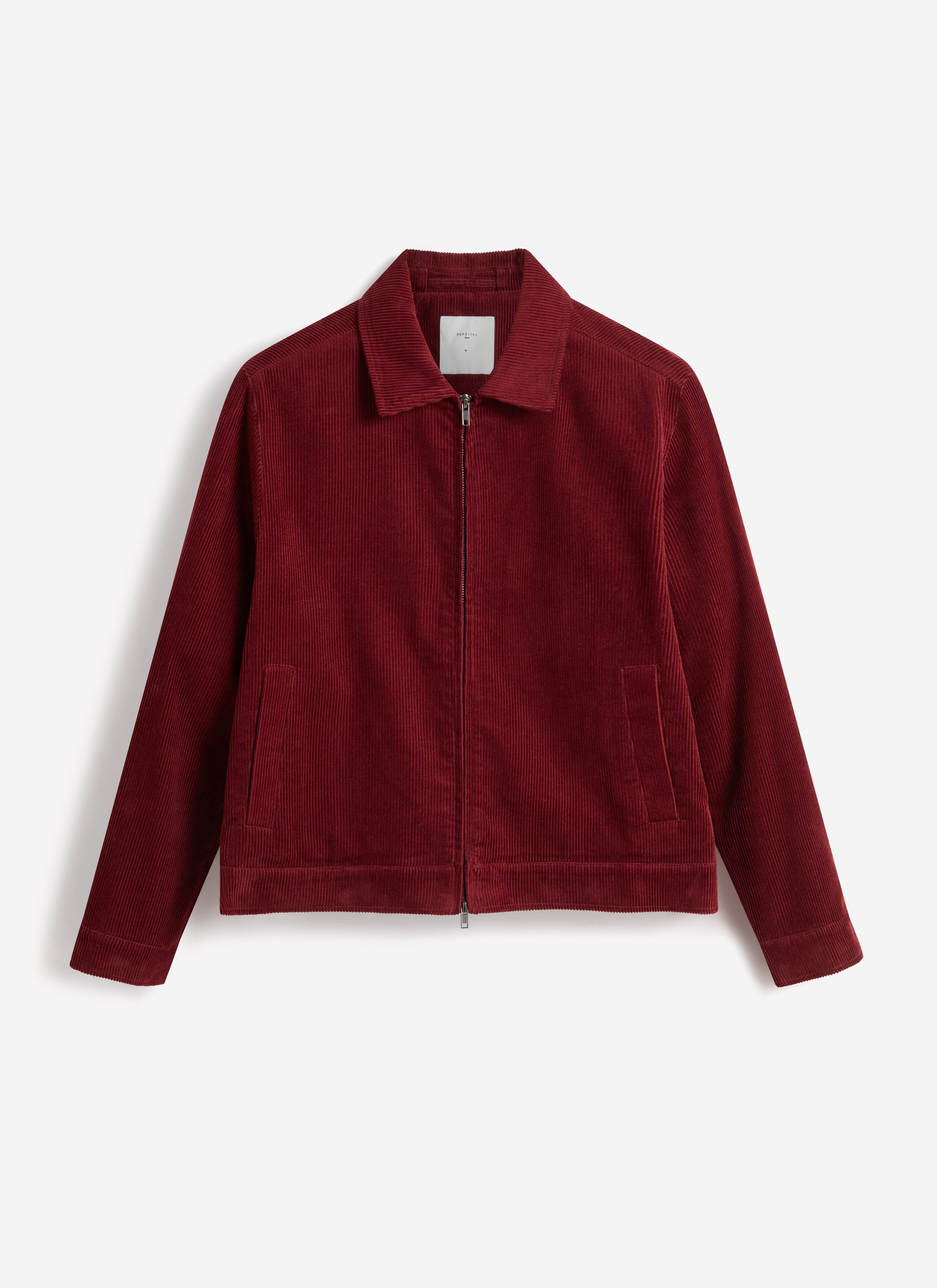 A flat lay of the Percival Marcel Cord Jacket in burgundy, showing the full front view against a white background.