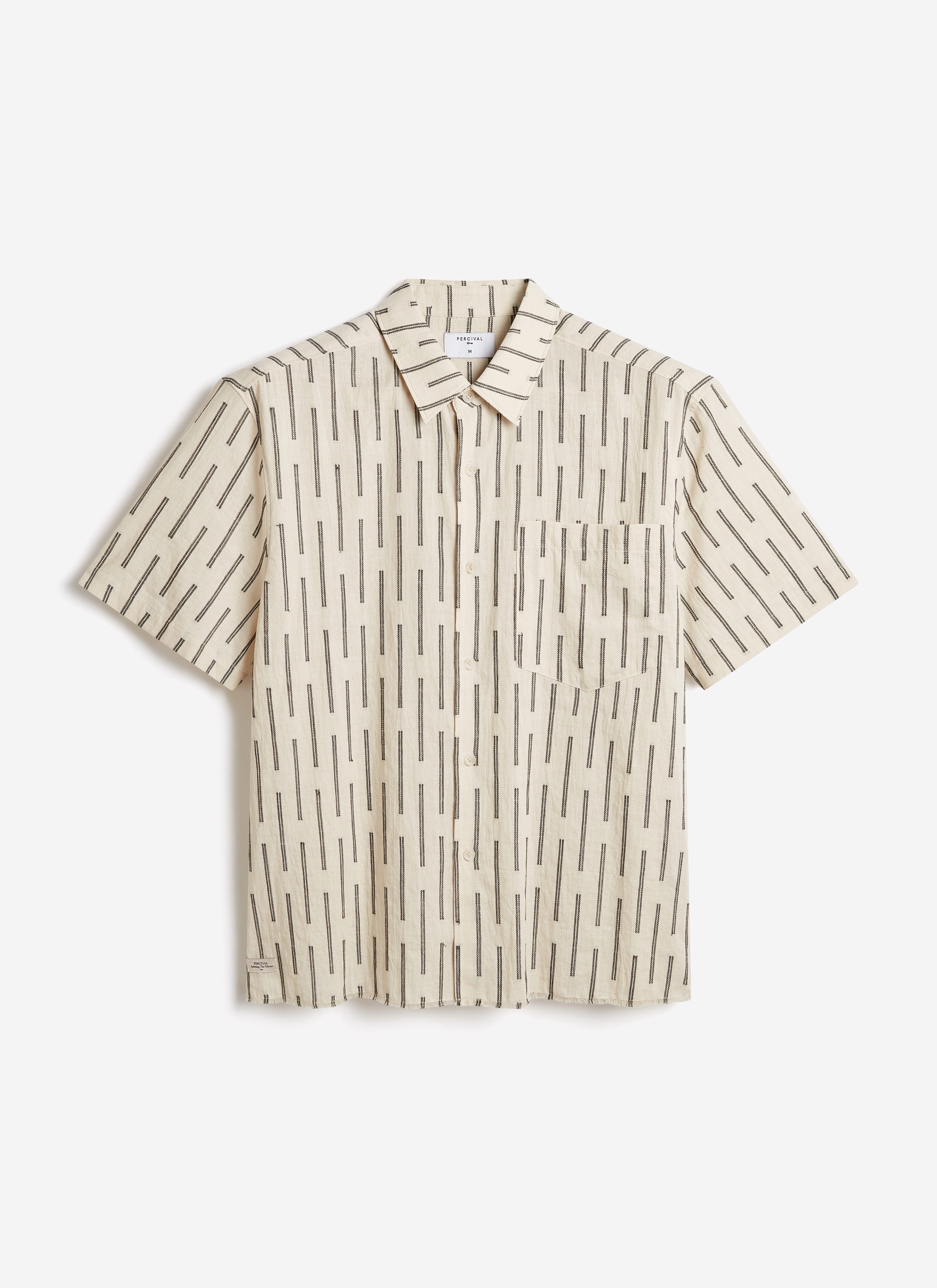 The Percival Nancy Boxy Shirt in ecru cotton featuring a black vertical jacquard stripe and chest pocket.