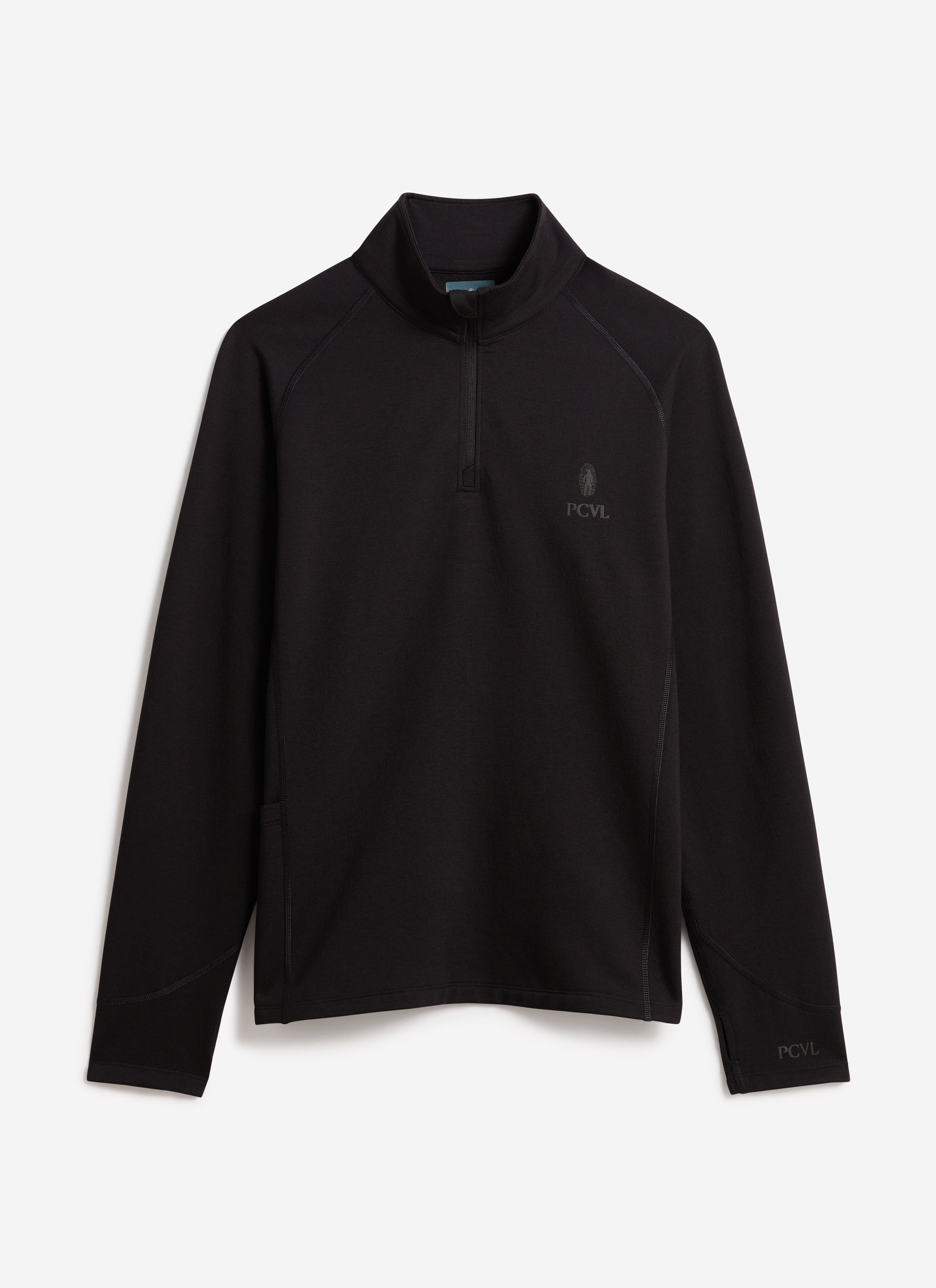 A flat lay of the PCVL Base Layer Quarter Zip Jacket in black by Percival, showing the funnel neck and subtle chest branding.