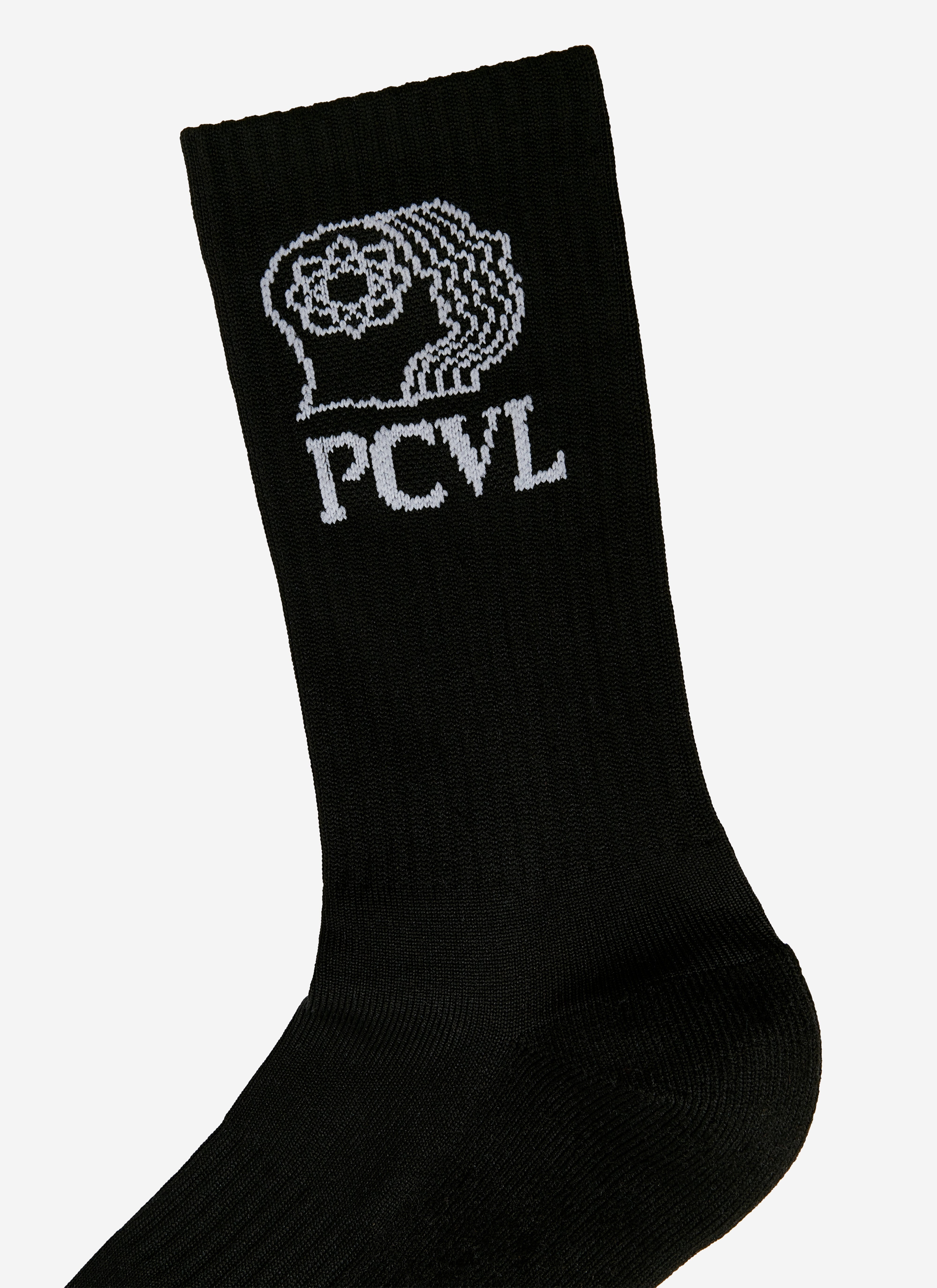 A close-up of the white jacquard PCVL graphic on the ribbed cuff of the black sport socks from Percival.