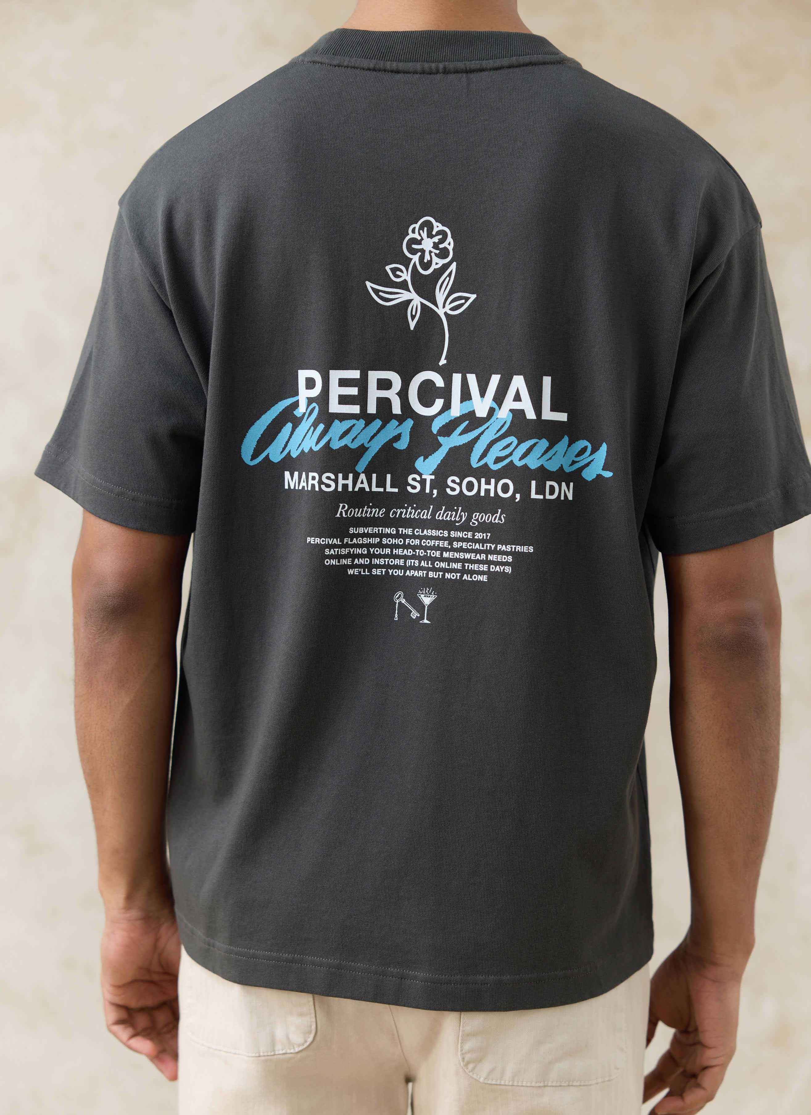 Back of the charcoal Percival Otto Oversized T-Shirt in organic cotton, featuring a white and blue floral back graphic.