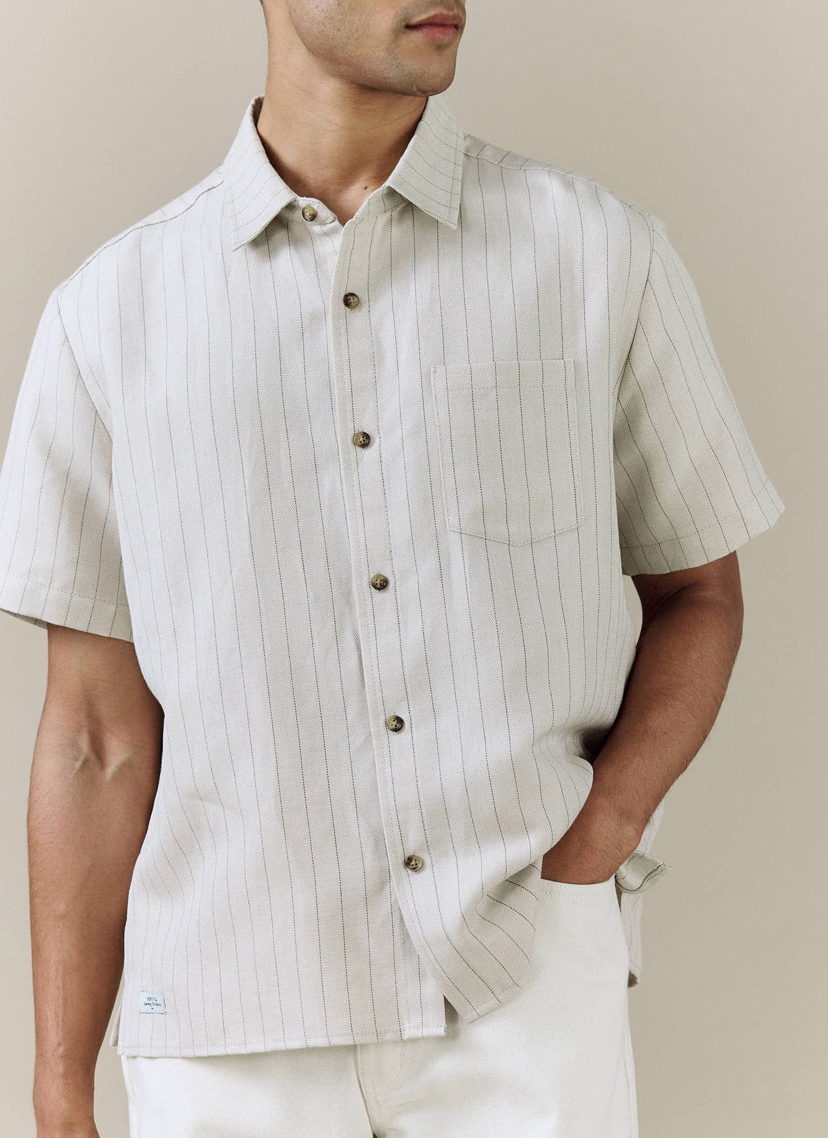 Percival Striped Boxy Shirt in cream linen blend, featuring subtle pinstripes and a herringbone weave.