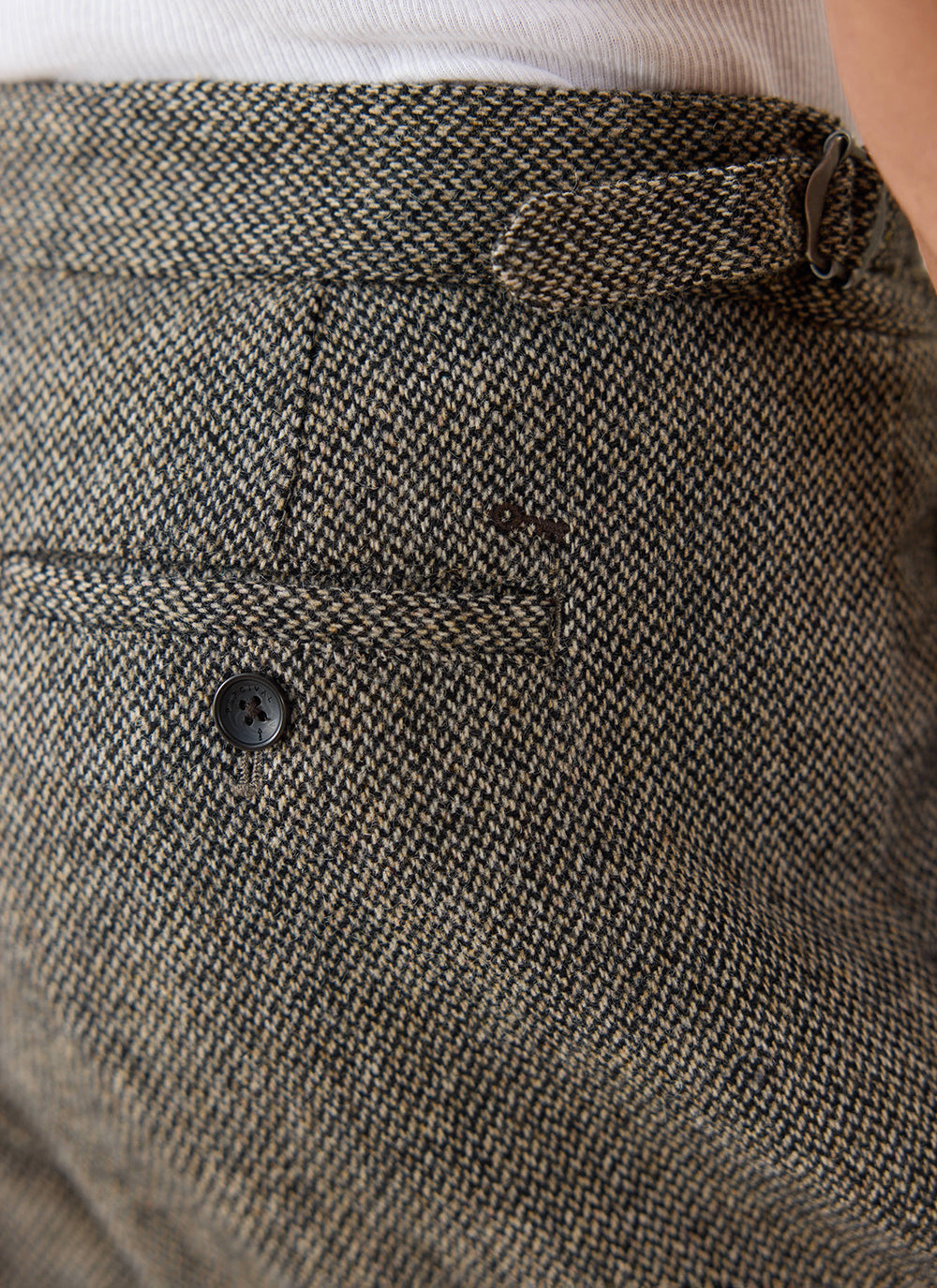 Percival Blake Double Pleated Tailored Trousers showing the back pocket and side adjuster buckle in grey birdseye wool.