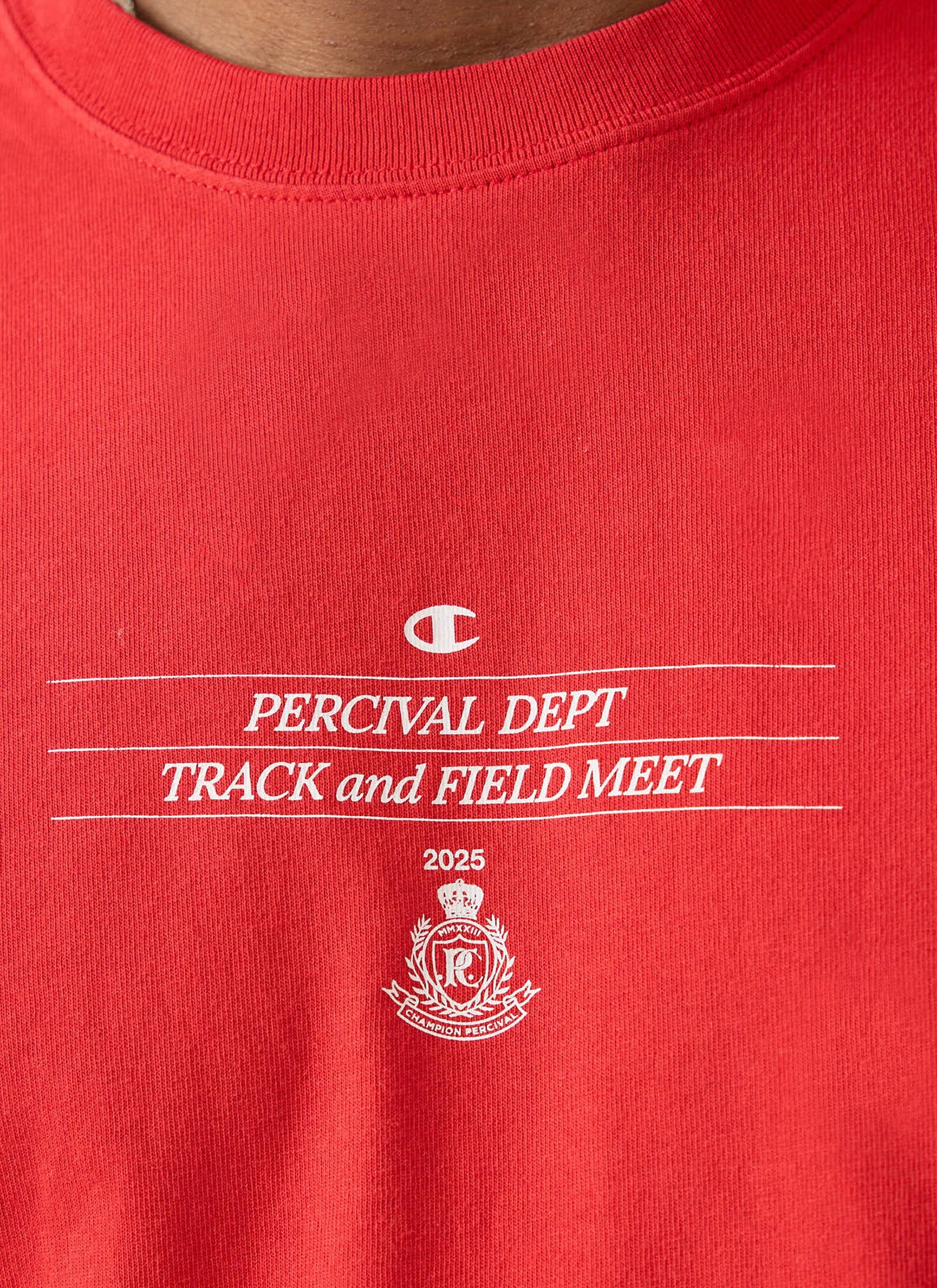 Close-up of the chest graphic on the red Track and Field Raw Hem T Shirt from the Percival x Champion collection.