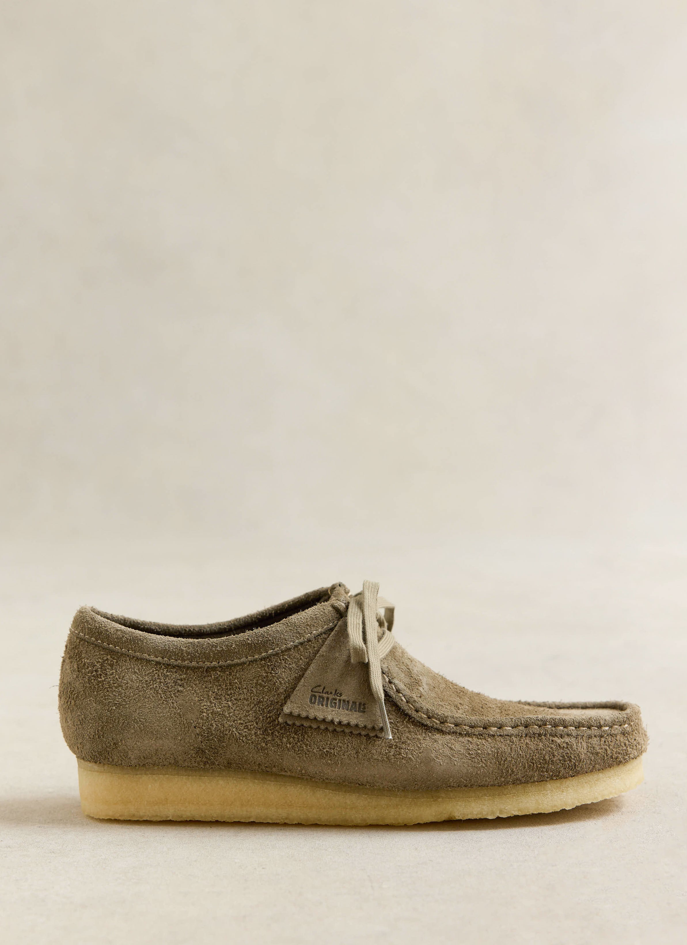 Smoke grey suede Clarks Originals Wallabee from Percival featuring hand-stitched seams and a signature crepe sole.