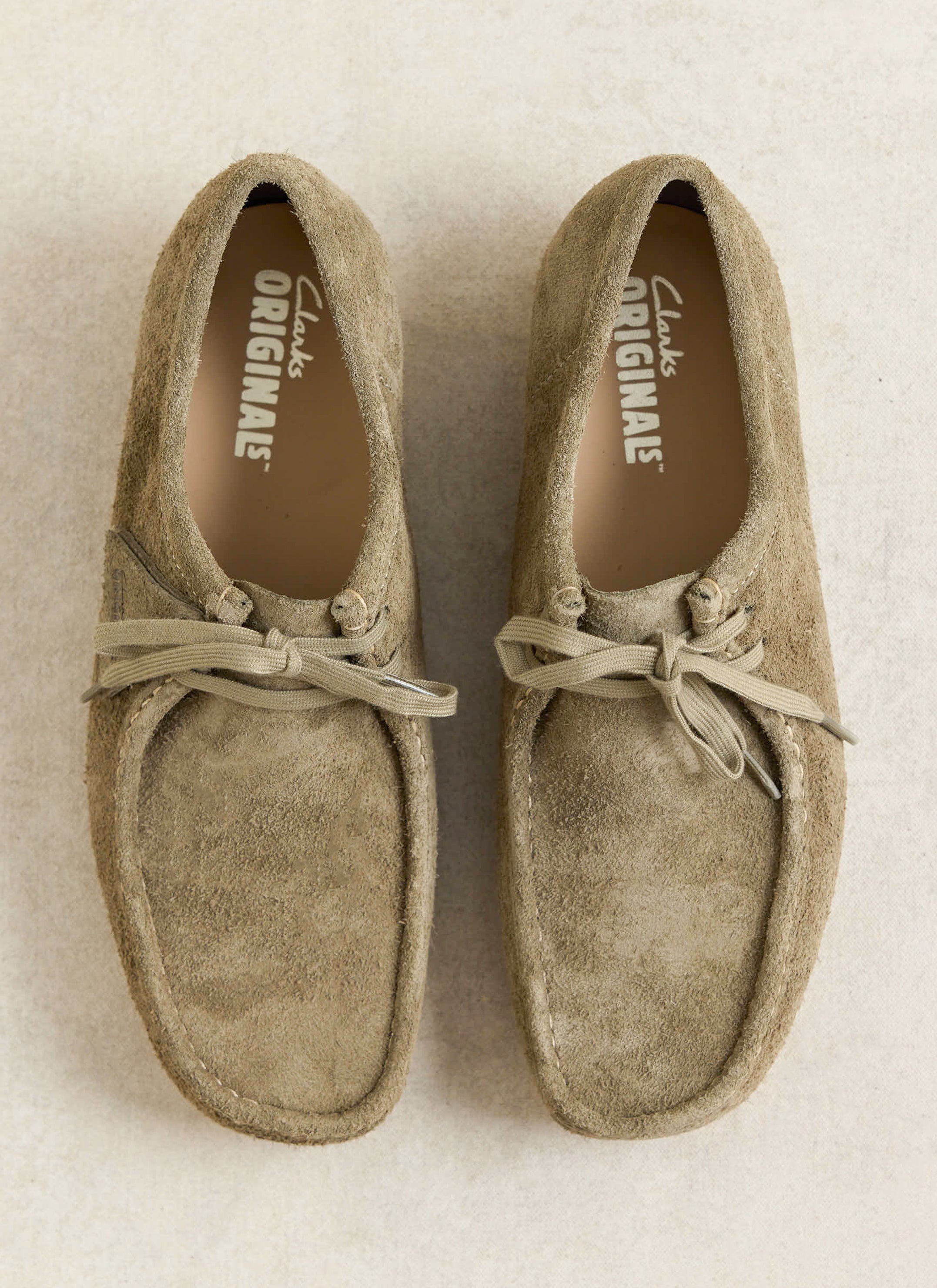Smoke grey suede Clarks Originals Wallabees with hand-stitched apron seams, a classic footwear choice from Percival.