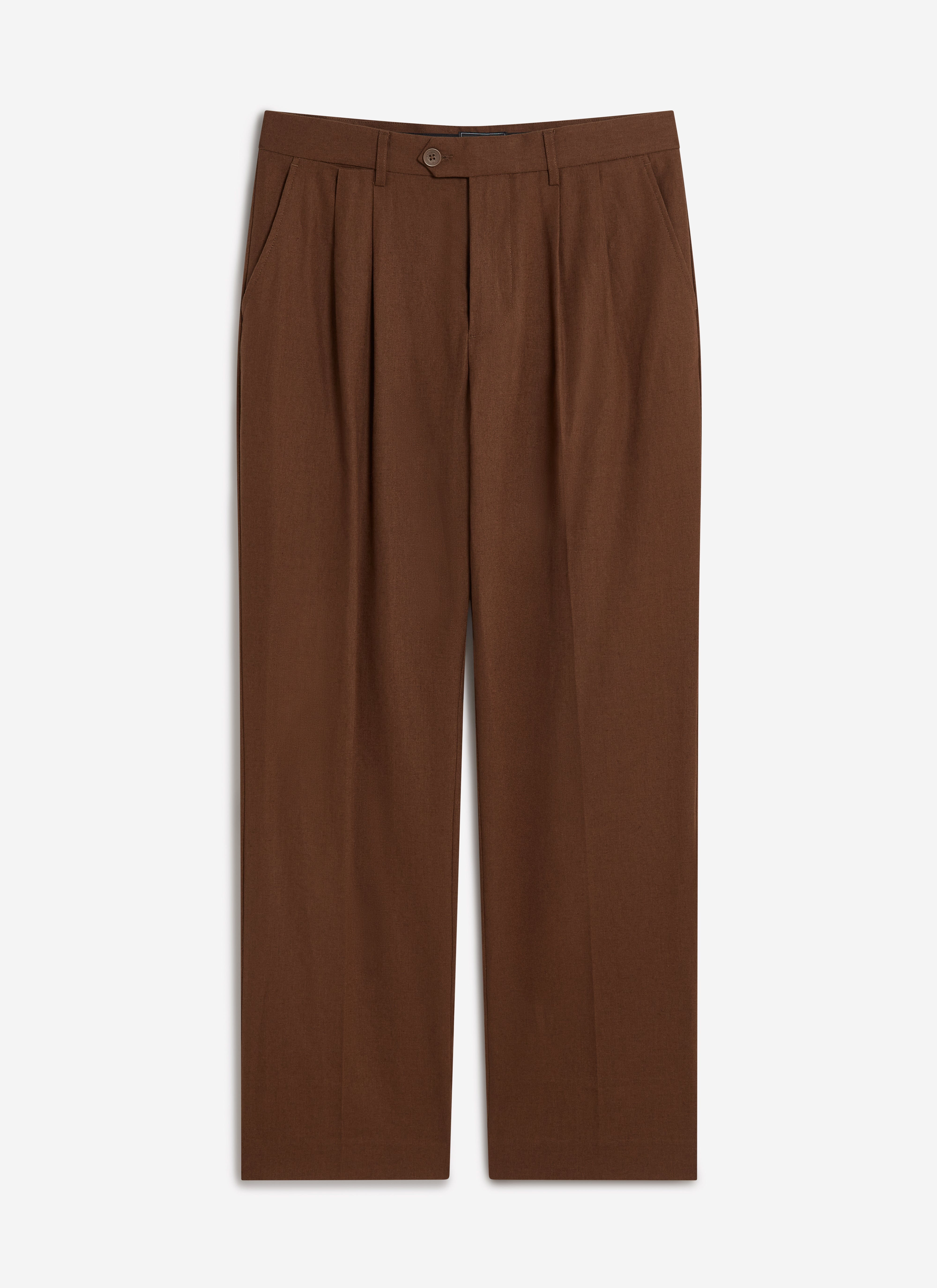 A flat lay of the Percival Pleated Tailored Trousers in brown linen, showing the double pleat detail at the waist.