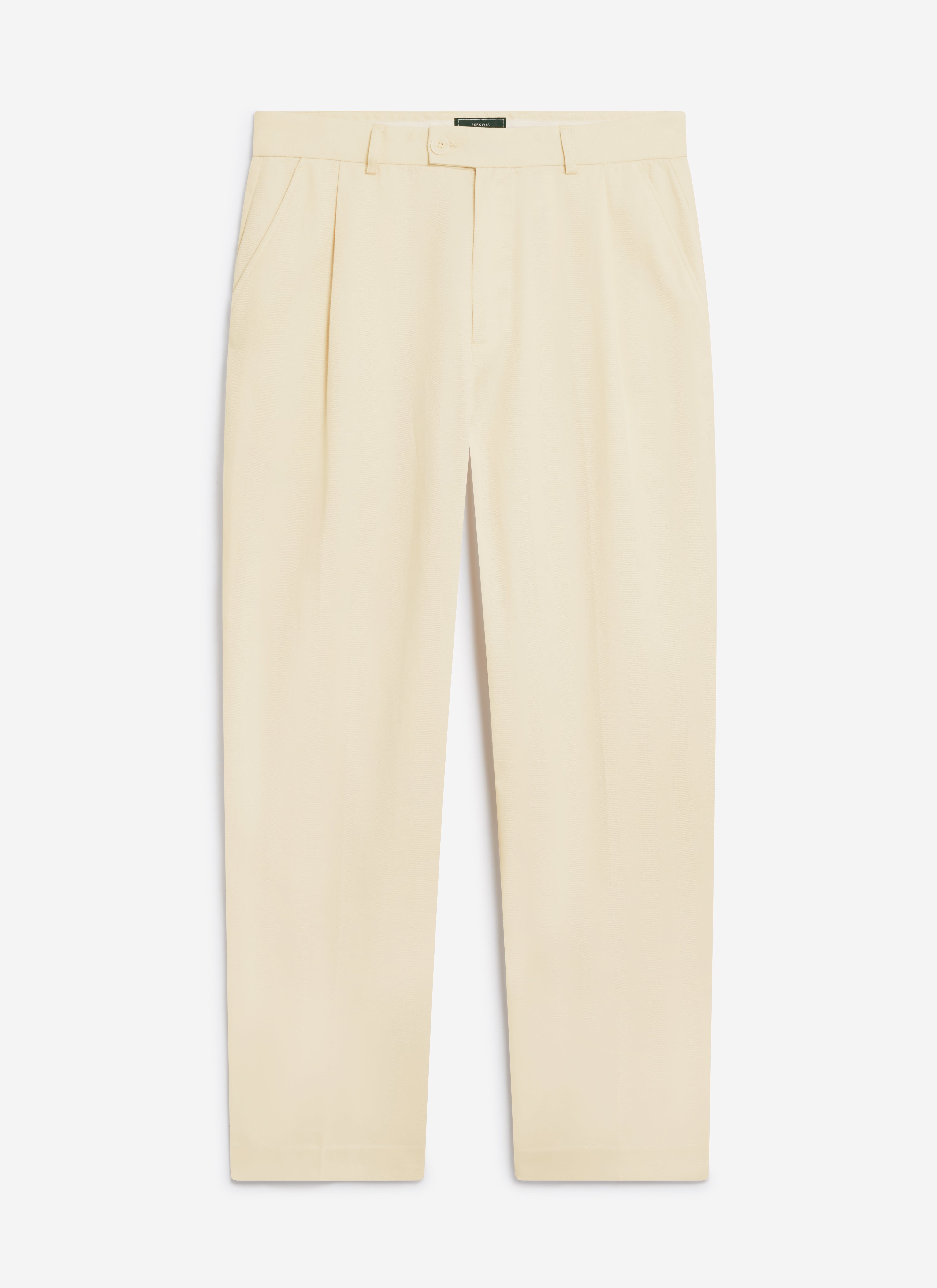 A flat lay of the Percival Pleated Tailored Trousers in cream, showcasing the soft Lyocell fabric and relaxed fit.