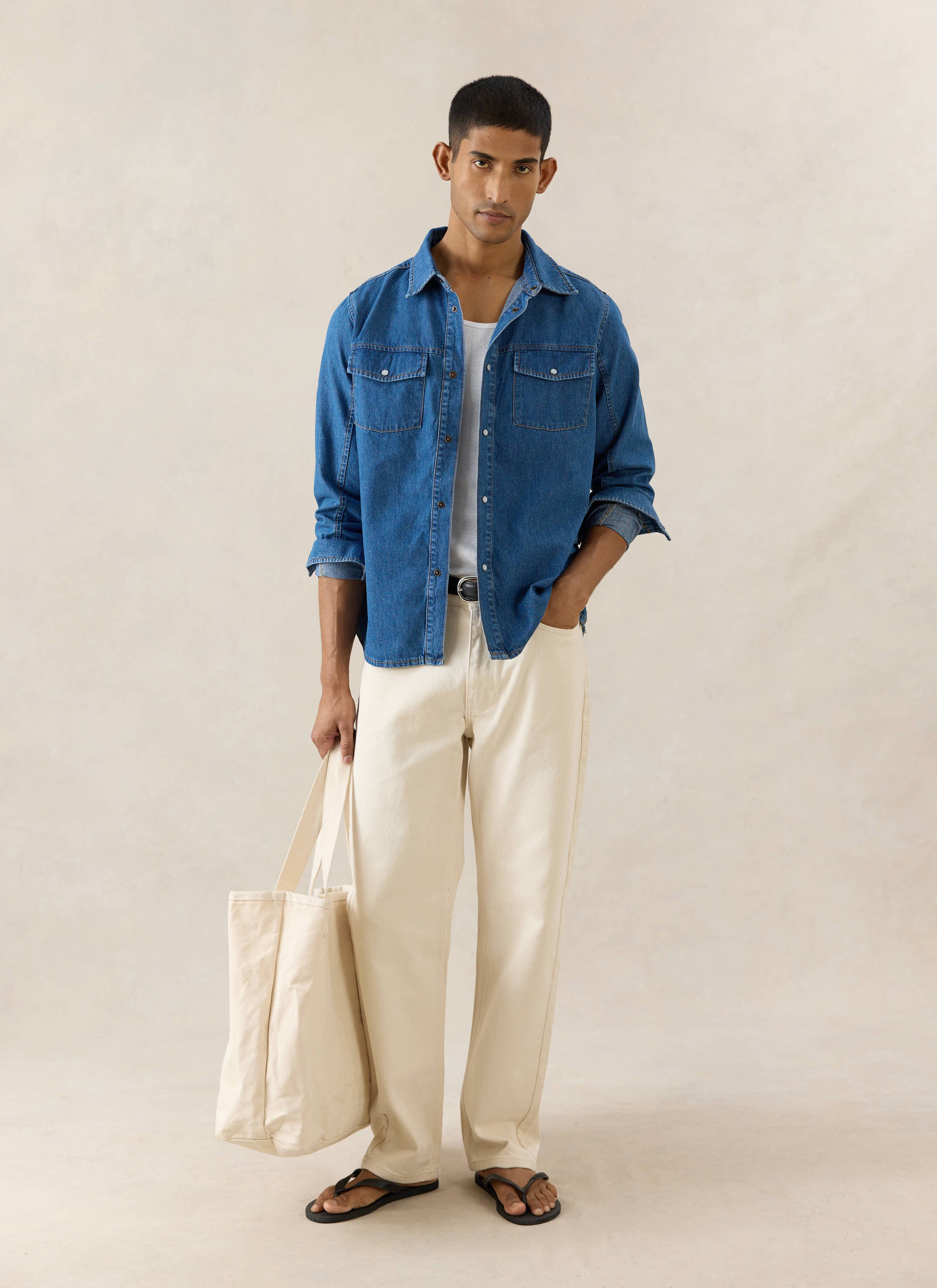 Percival Vintage Wash Western Shirt in mid wash blue denim with pearl buttons, styled with cream stone wash jeans.