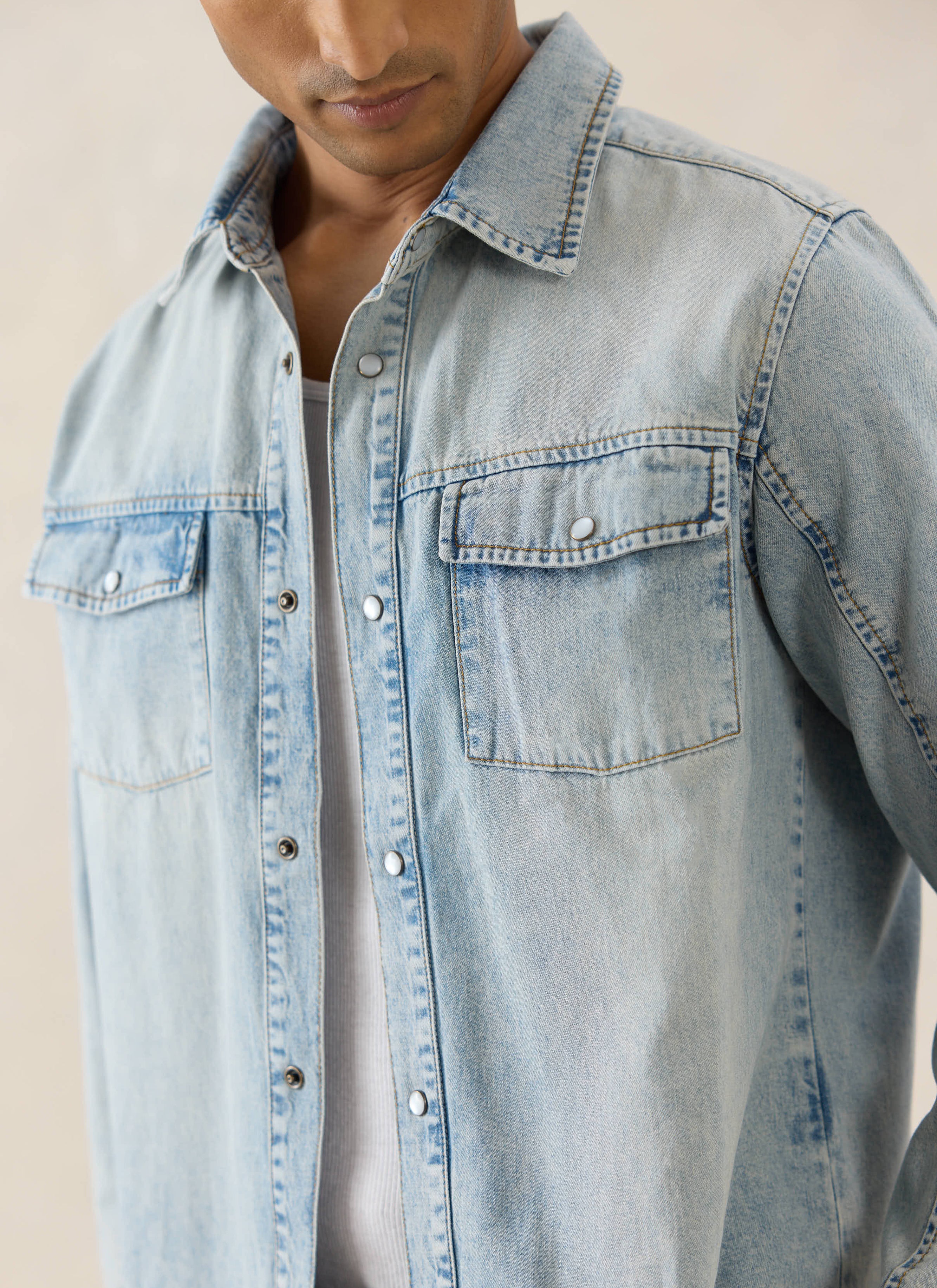 The Percival stone wash denim Vintage Wash Western Shirt, featuring pearl detail buttons and twin chest pockets.