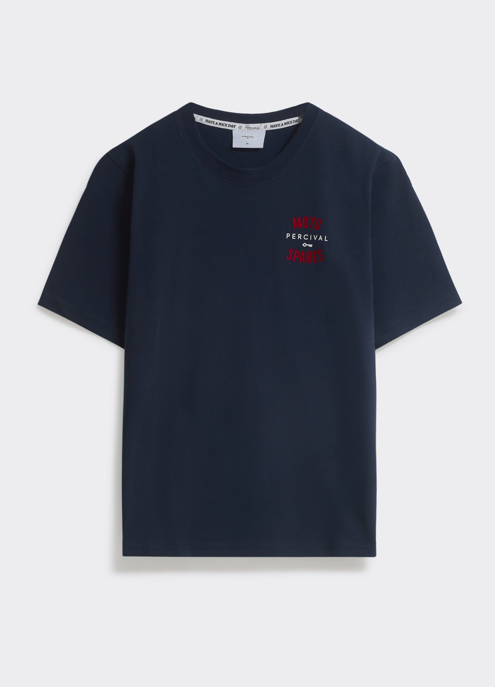 The Percival Racer T-Shirt in navy blue cotton jersey, featuring a vintage moto chest graphic, shown flat.