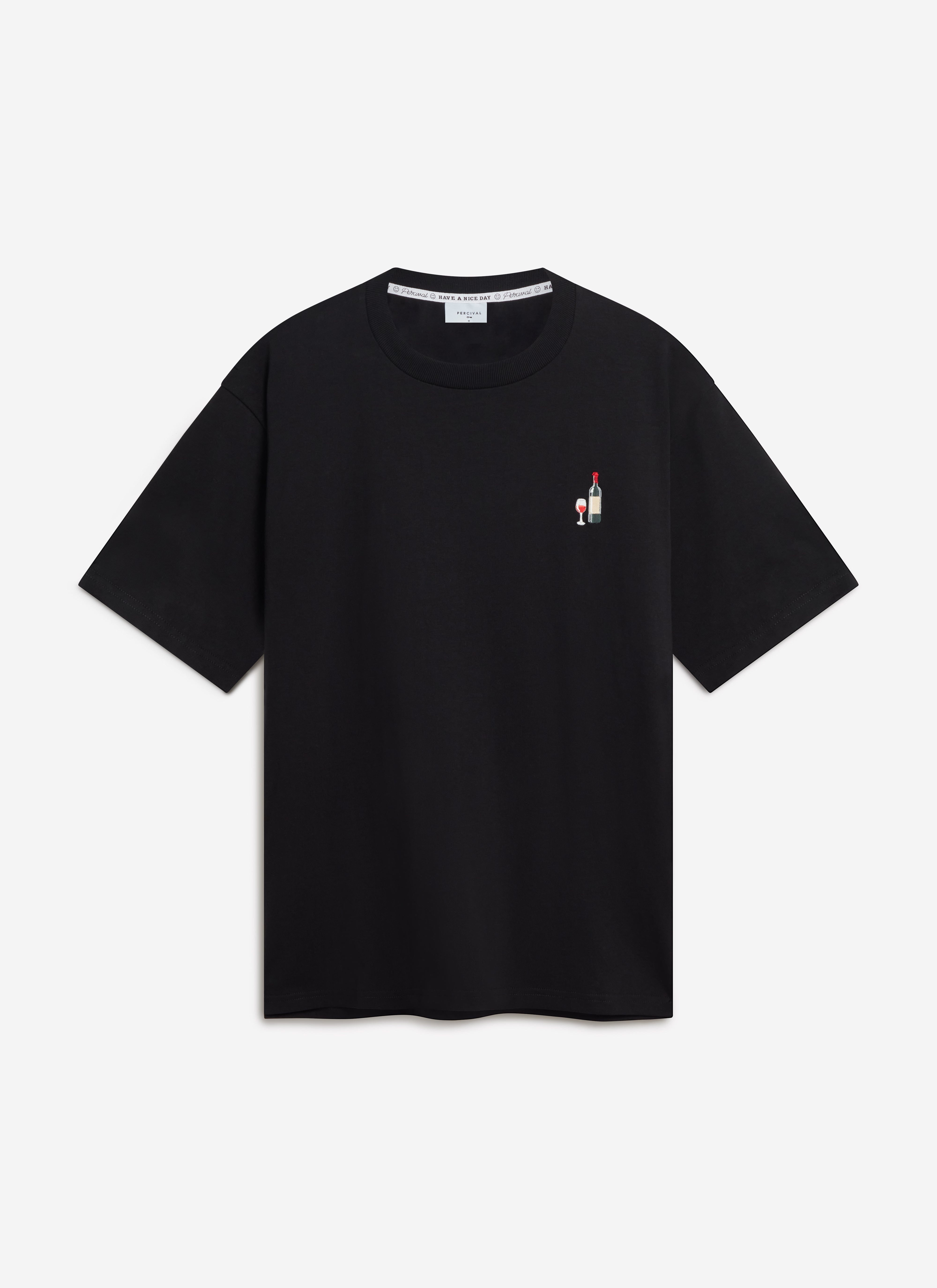 A flat lay of the Percival Red Wine Embroidered T-Shirt in black, showing the detailed embroidery of a wine bottle and glass.