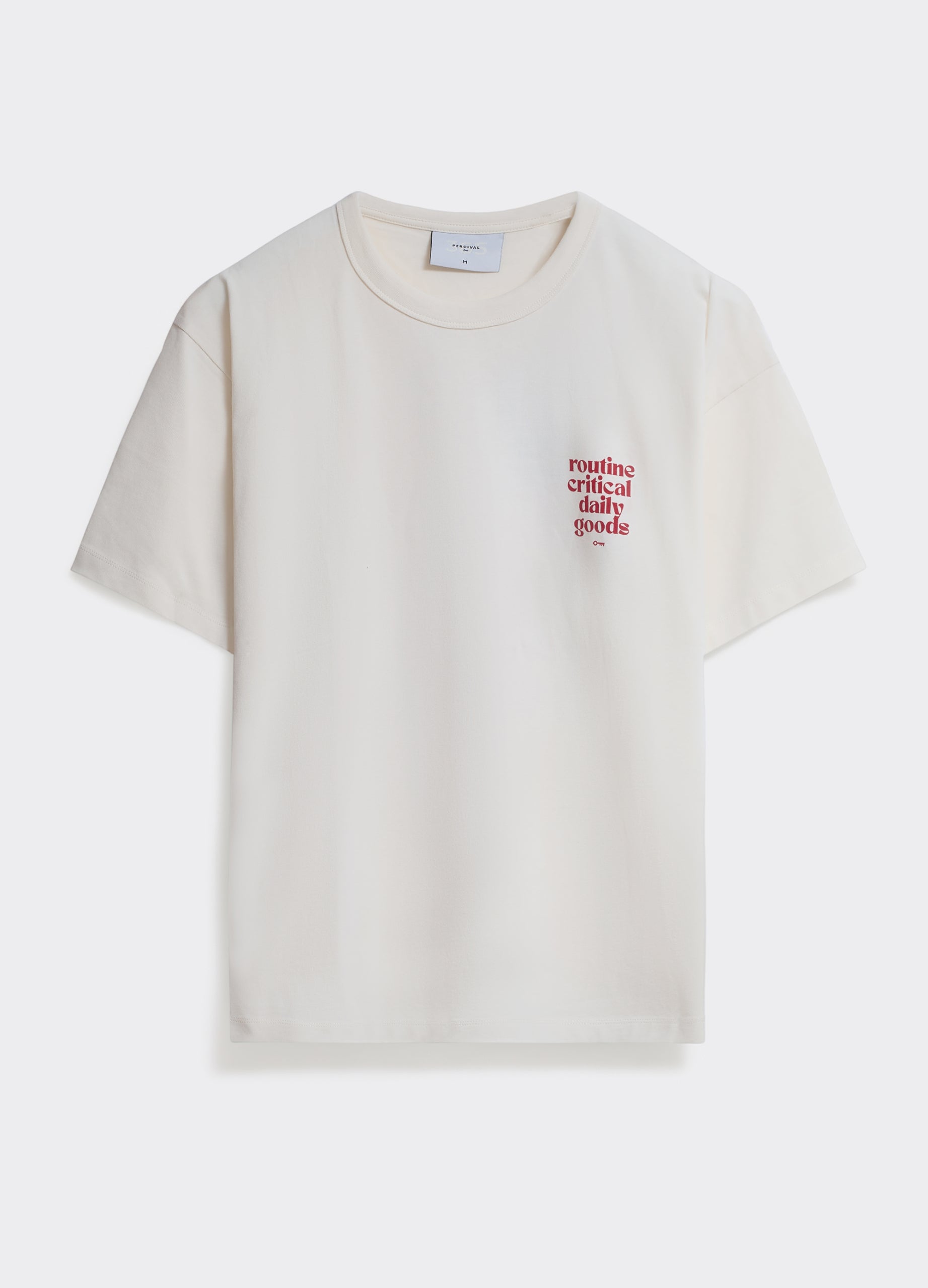 Percival Routine T-shirt in off white cotton jersey, featuring a red chest print, displayed flat against a grey background.