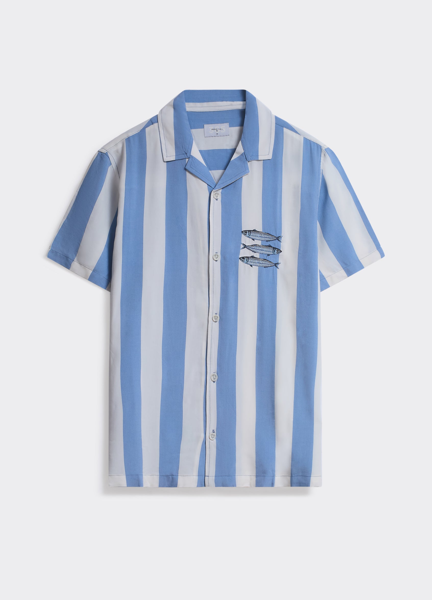The Percival Sardines Shirt in blue and white vertical stripes, featuring chest embroidery and a classic camp collar.