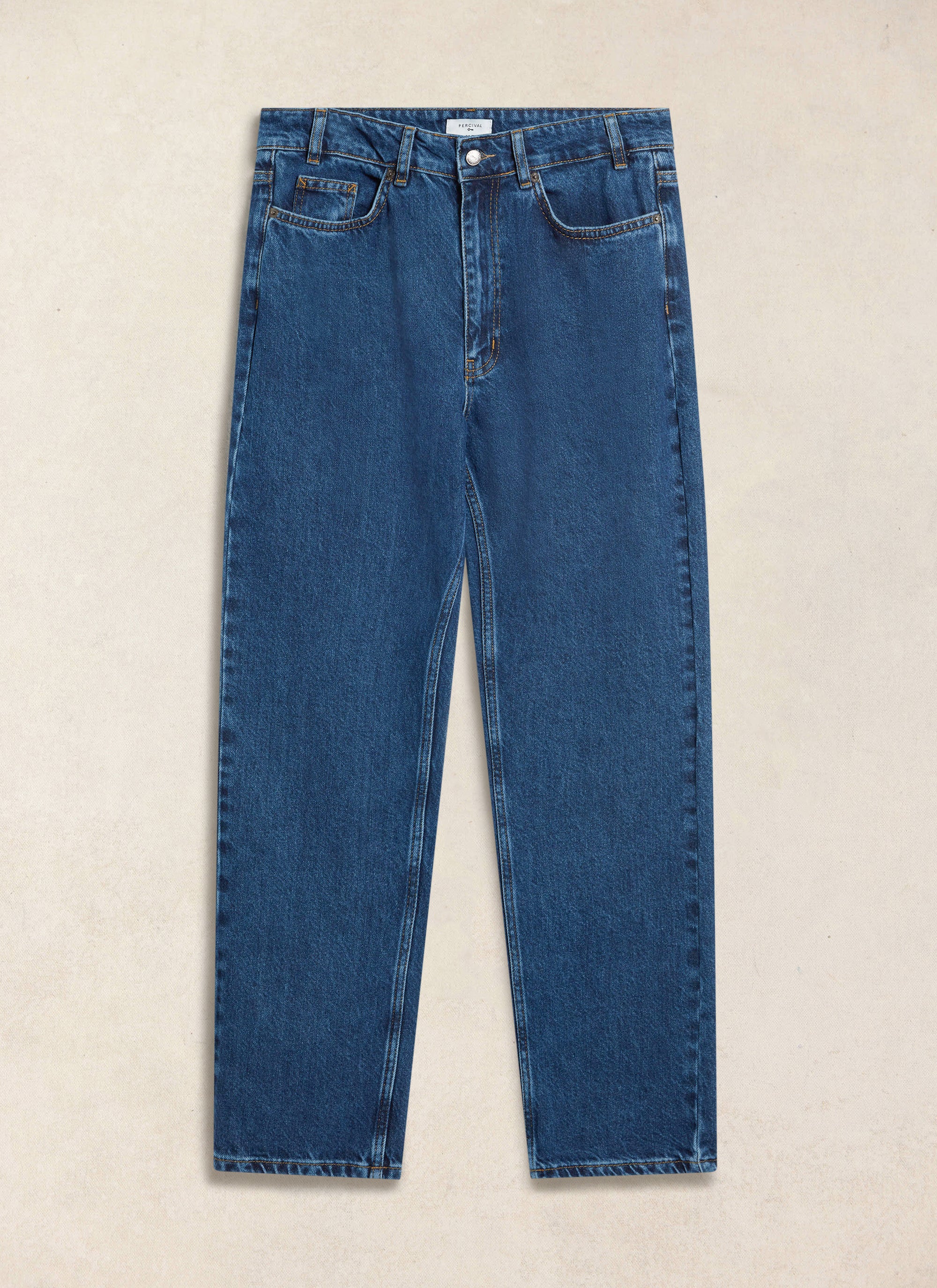 Mid wash blue Percival straight leg heritage denim jeans in 14oz cotton, shown flat in a studio shot.