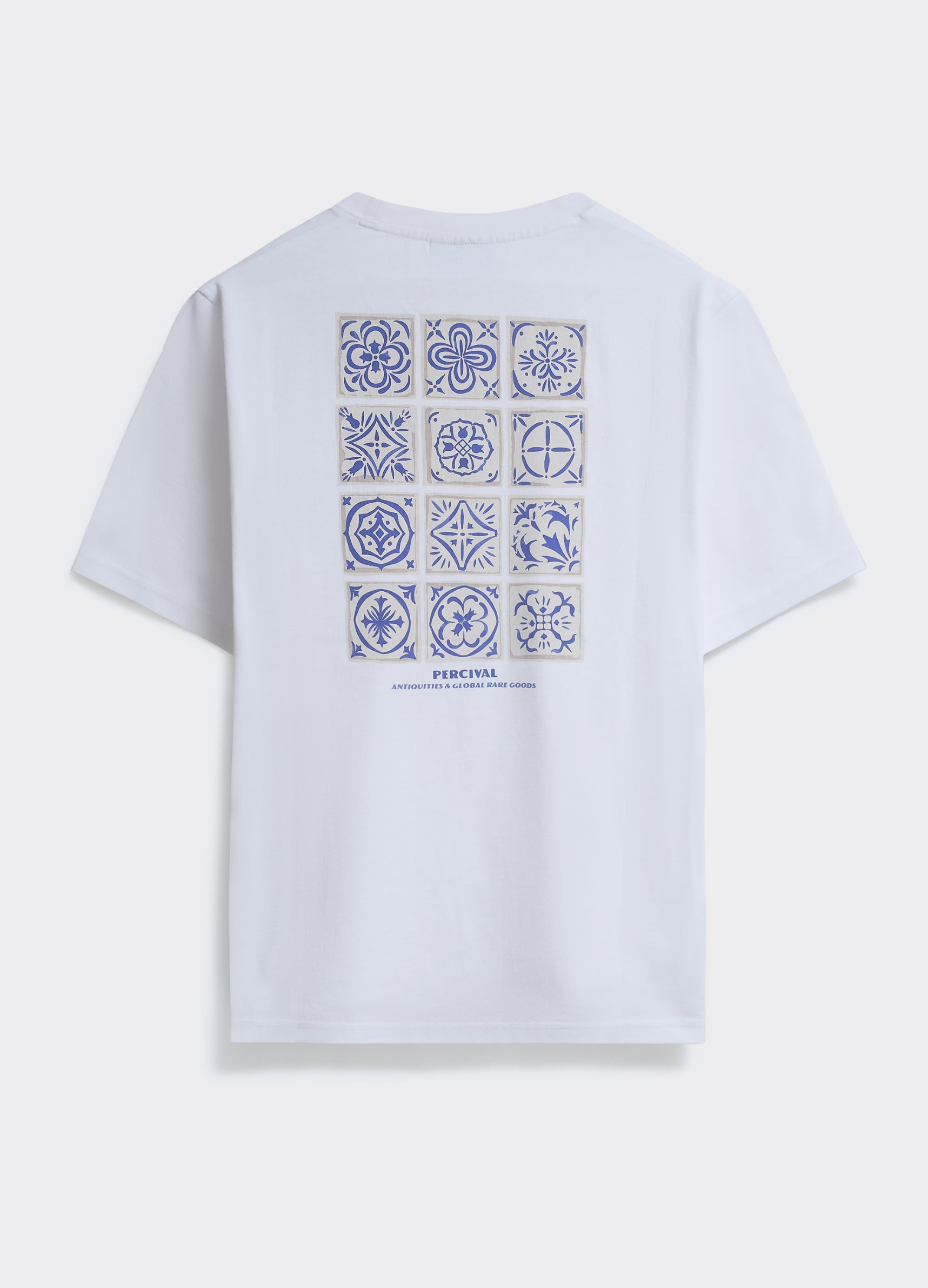 The Percival Tiles T-Shirt in white, featuring a blue tile-inspired back graphic on soft cotton jersey.