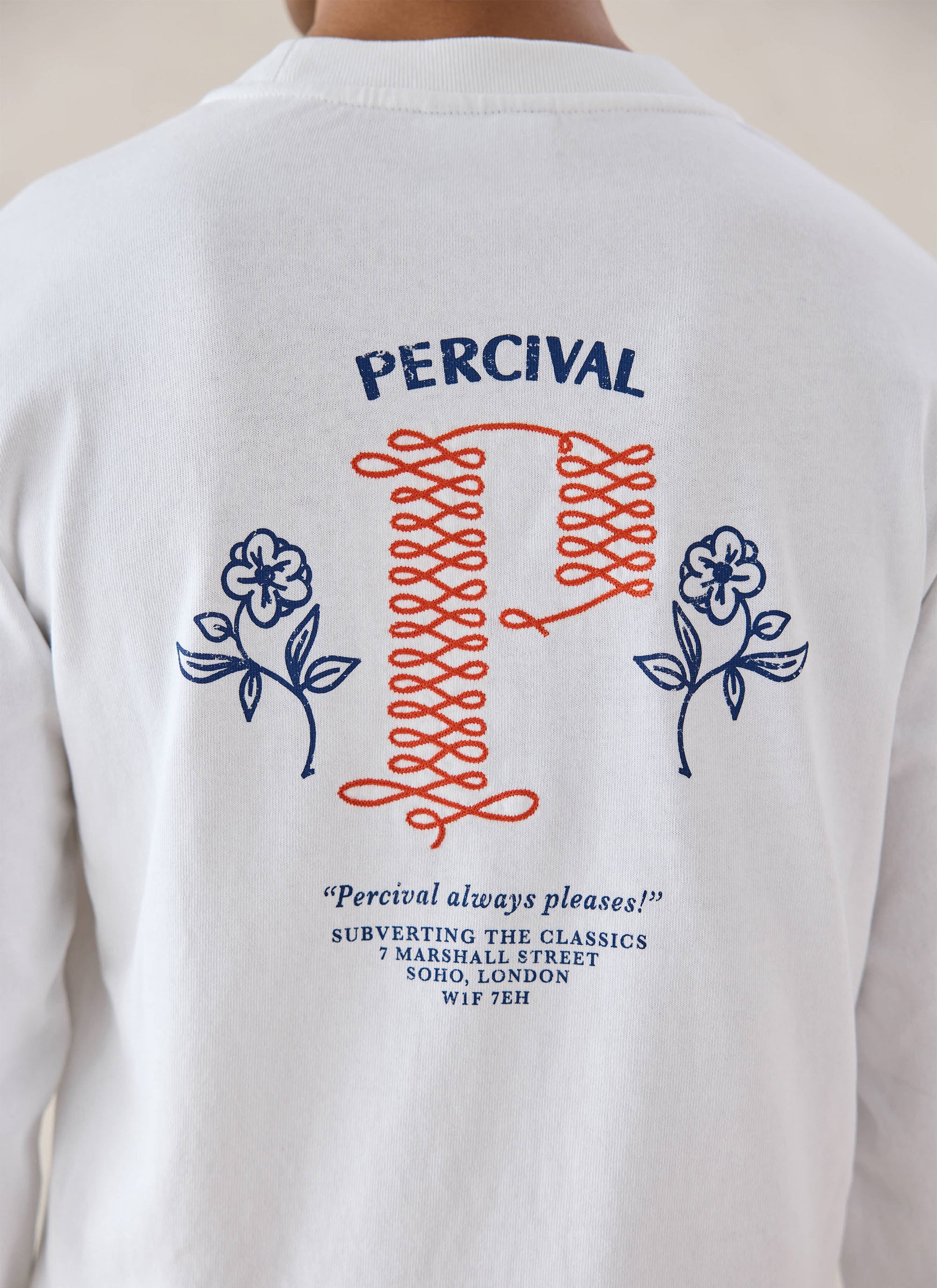 White Percival Tucker organic cotton long sleeve t-shirt, showing a detailed close-up of the embroidered back graphic.