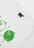 close up of white t shirt with green print of two tomatoes and text "quite tricky"